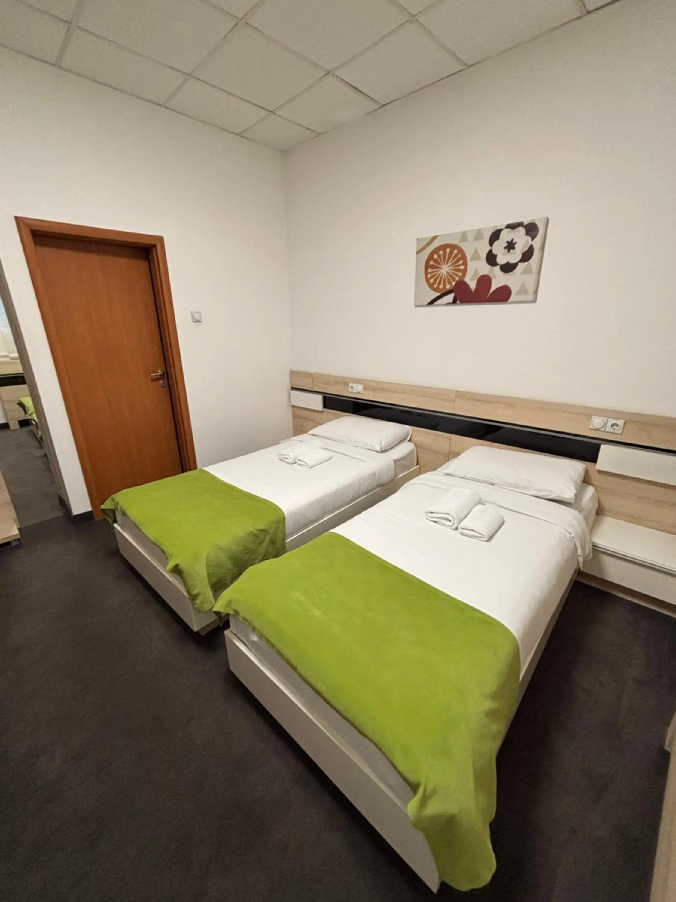 Bed in Garni Hotel Consul