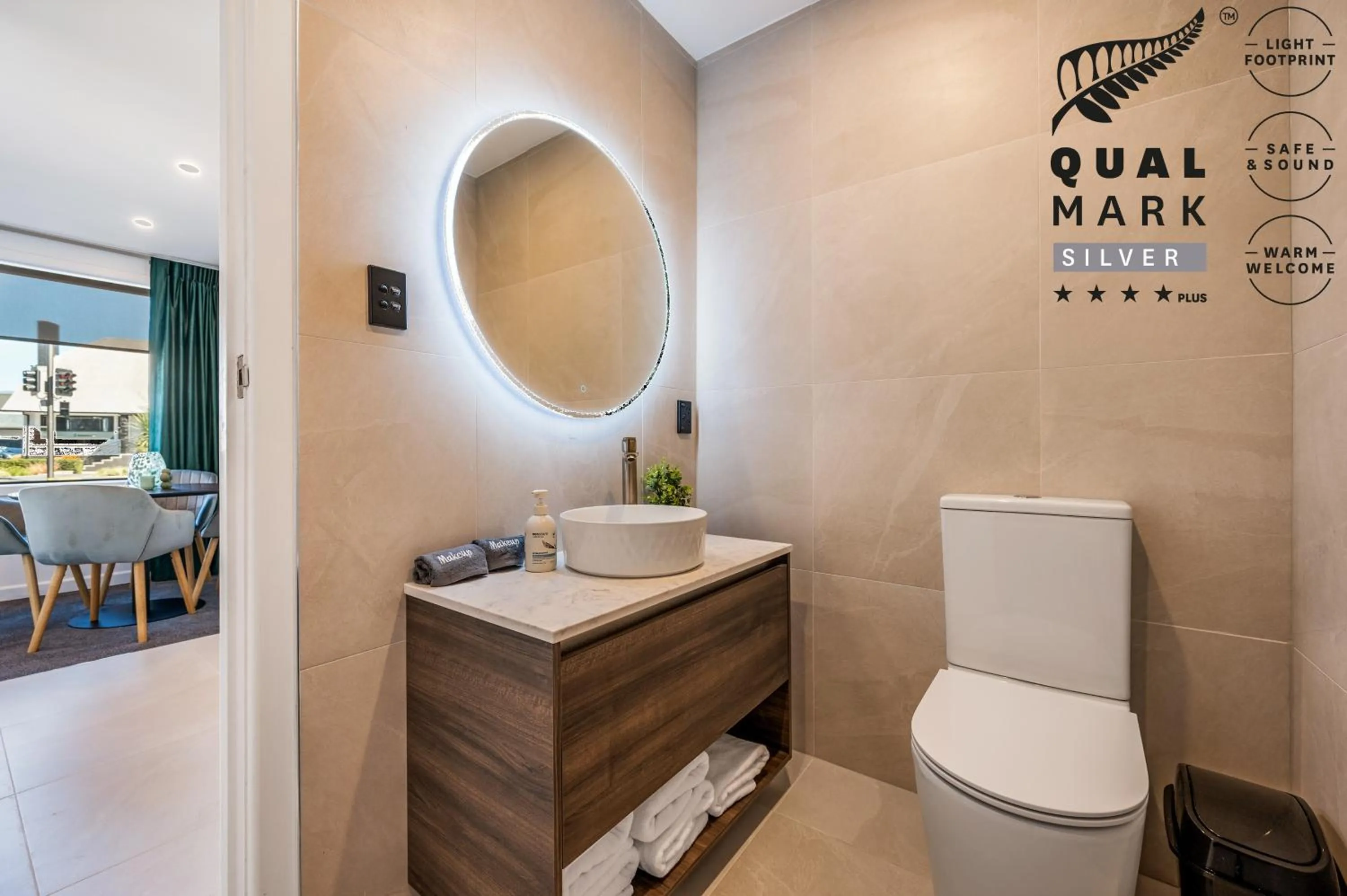 Toilet in Luxe Suites & Apartments