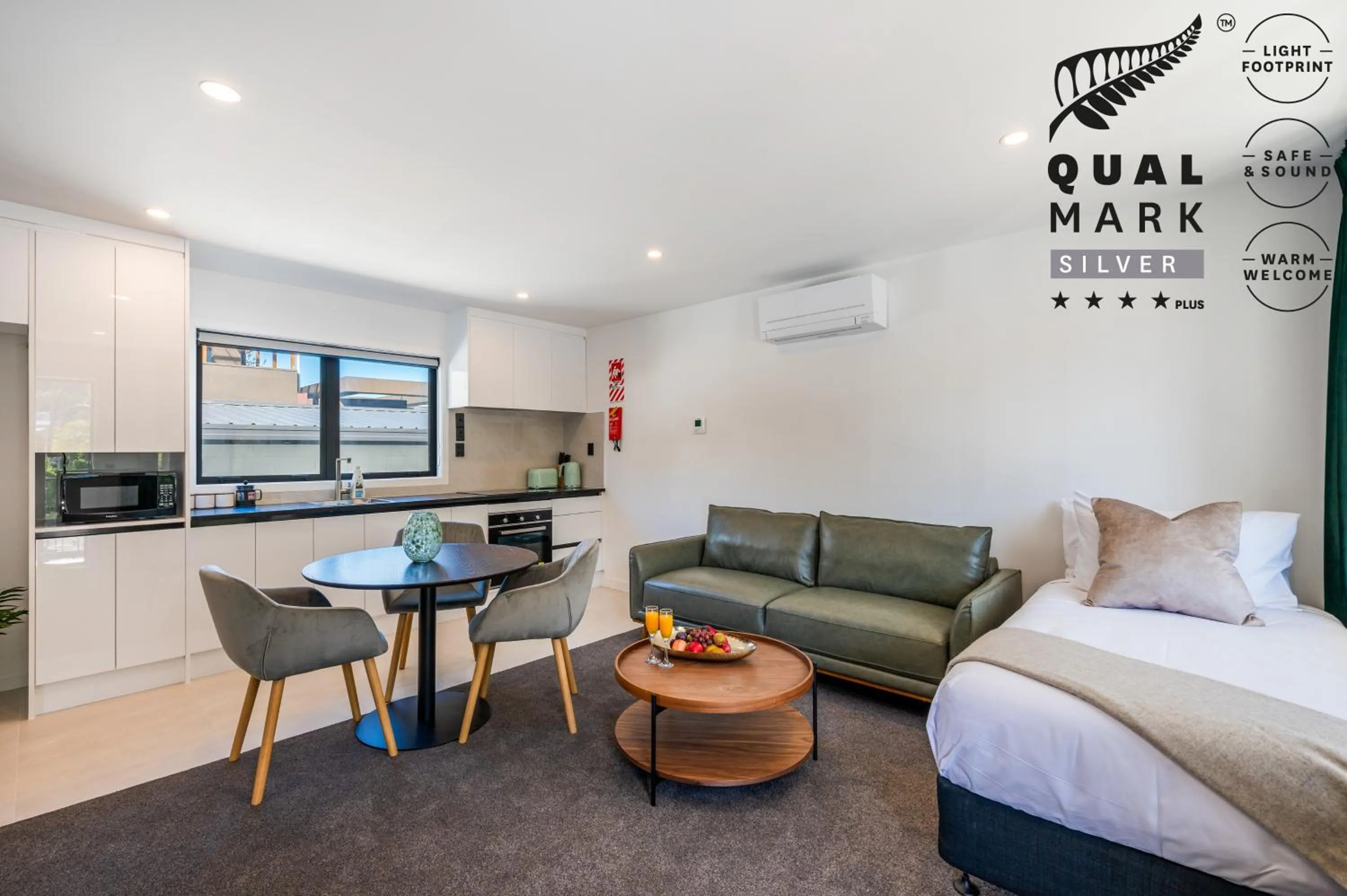 Bed in Luxe Suites & Apartments