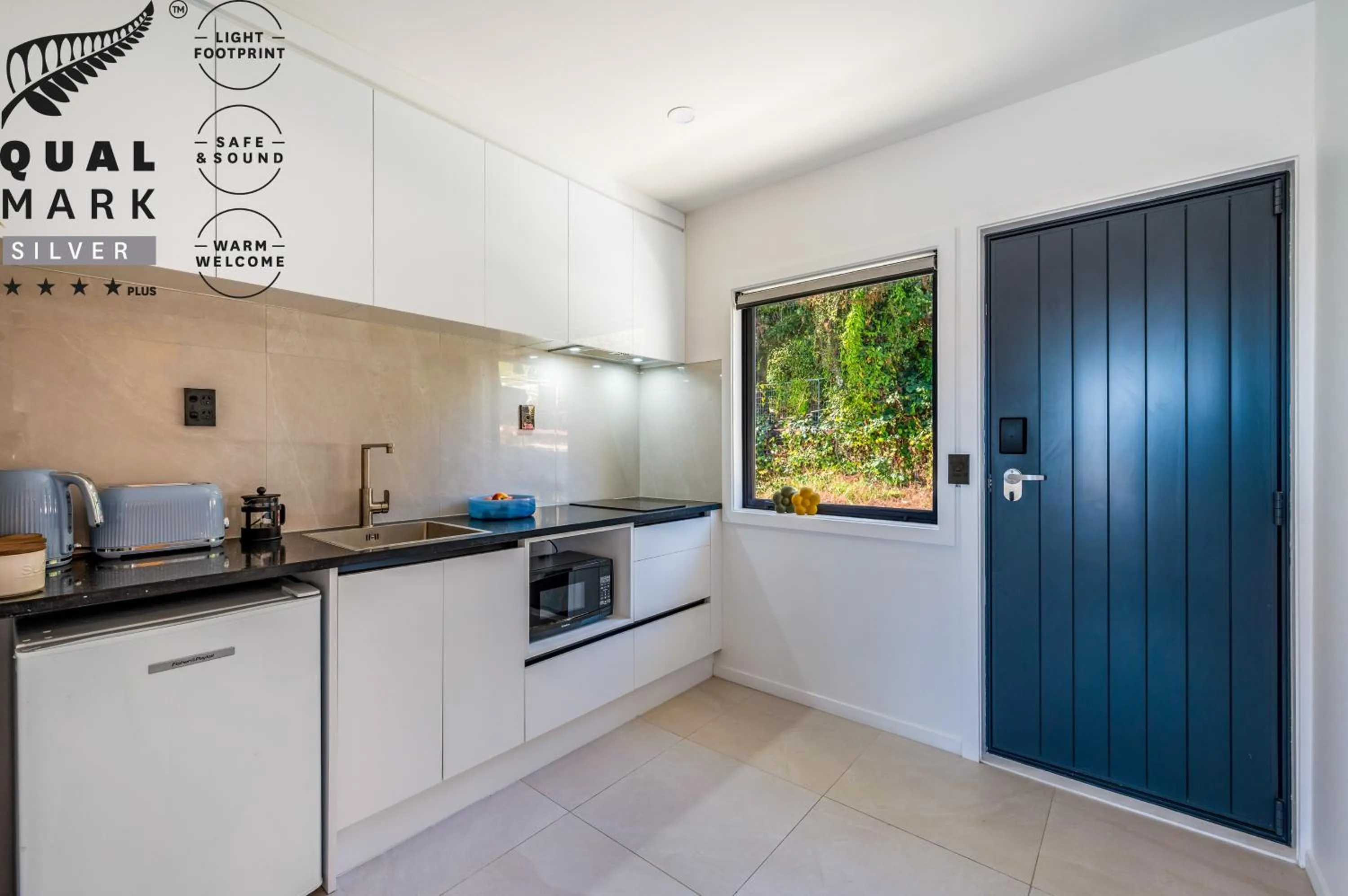 kitchen in Luxe Suites & Apartments