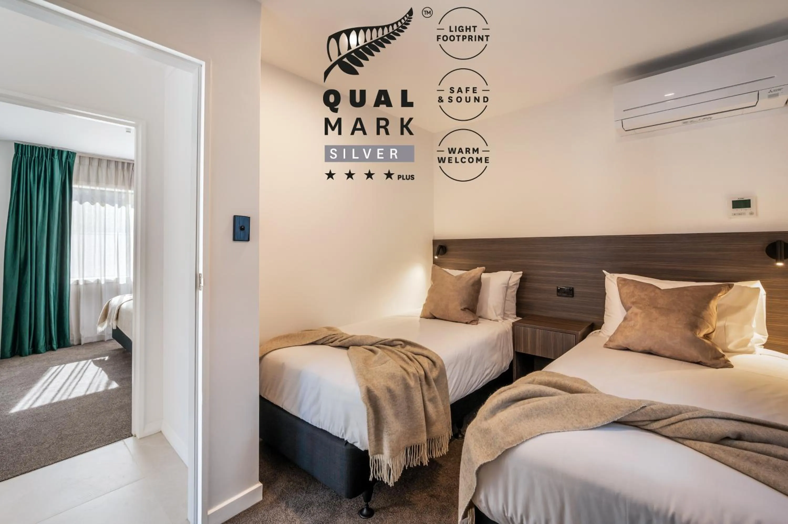 Bed in Luxe Suites & Apartments