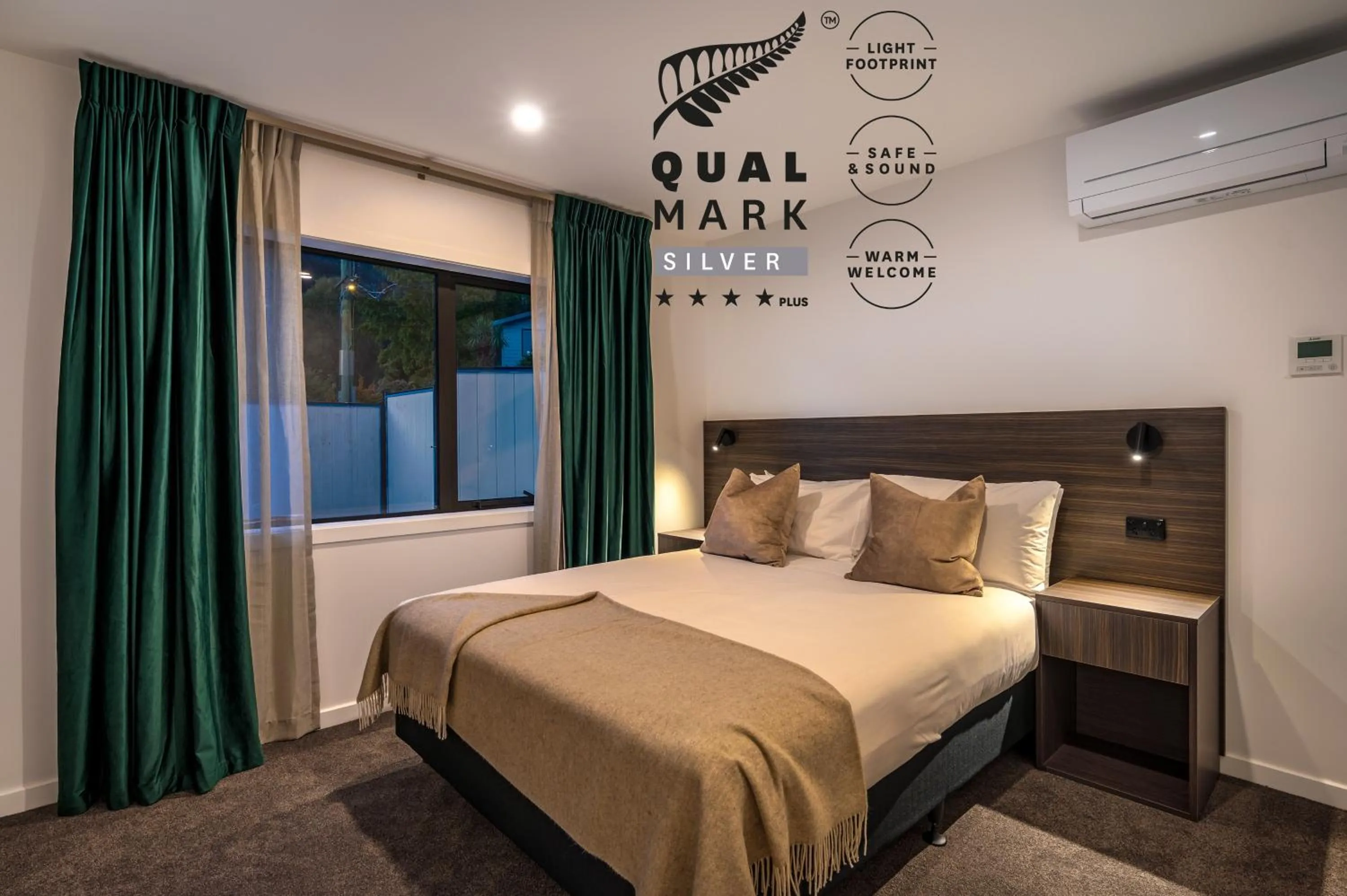 Bed in Luxe Suites & Apartments