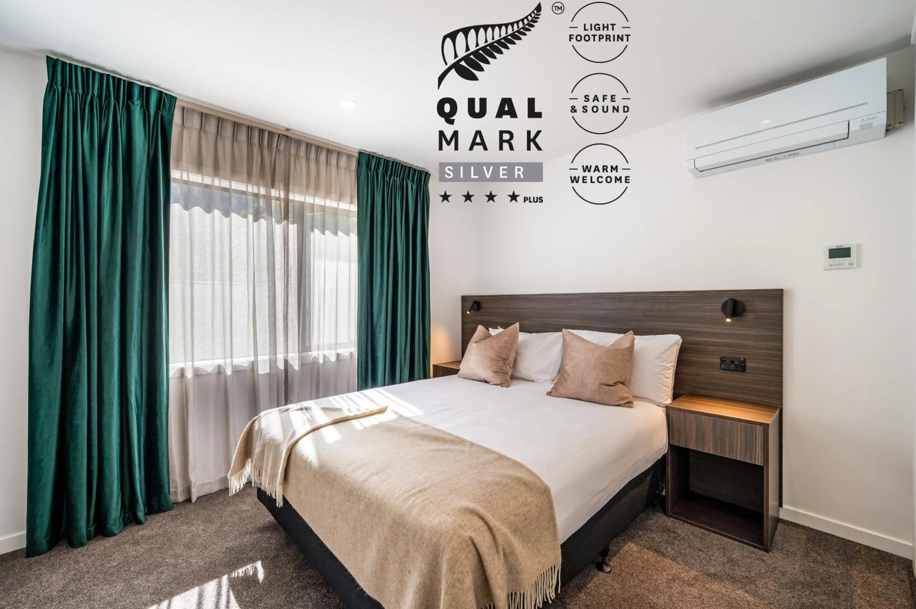 Bed in Luxe Suites & Apartments