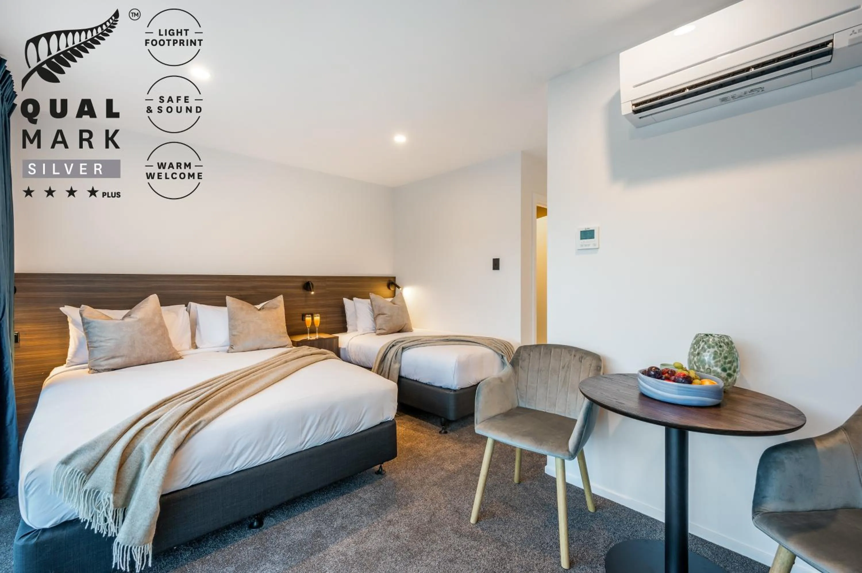 Bed in Luxe Suites & Apartments