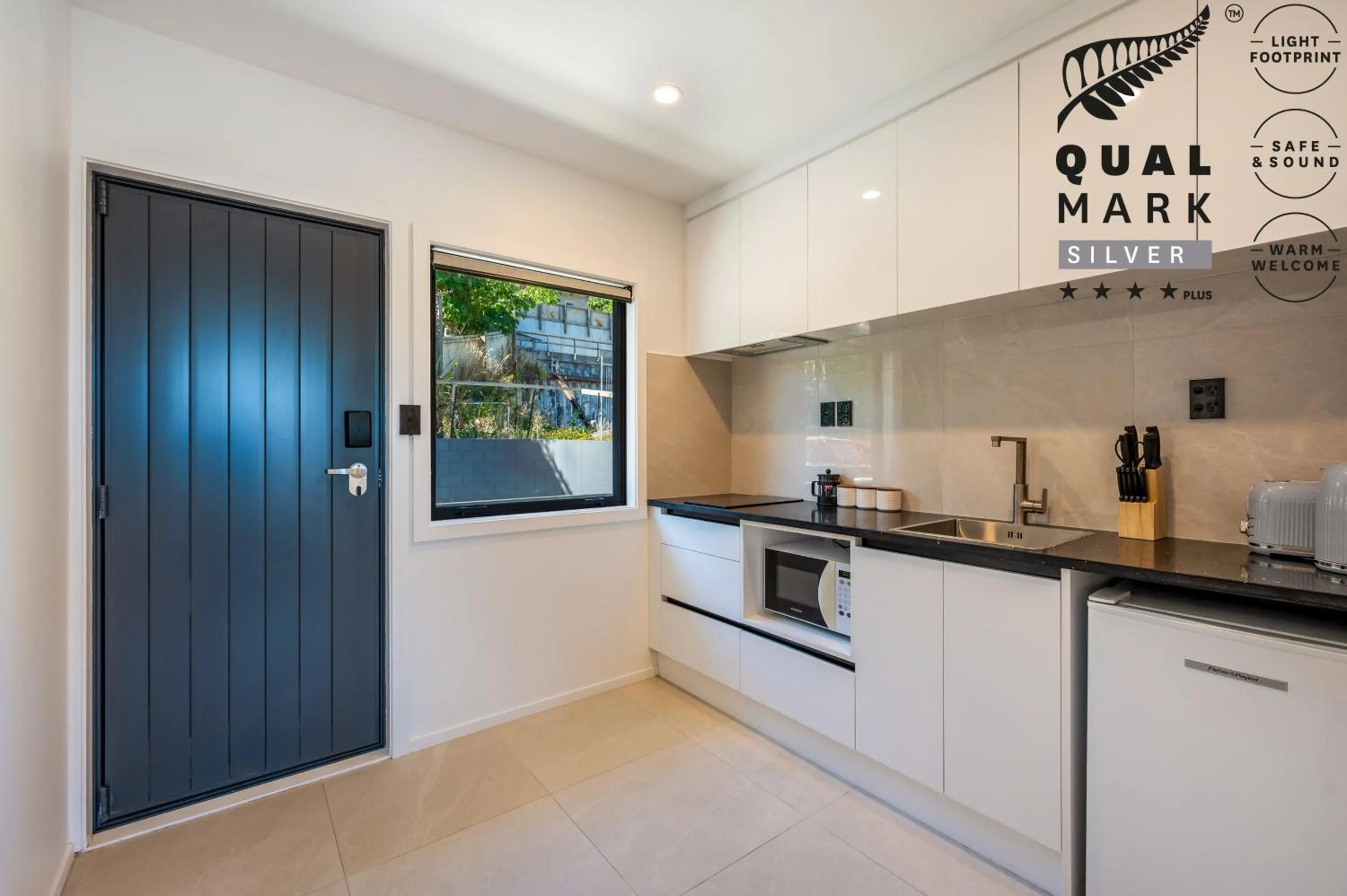 kitchen in Luxe Suites & Apartments