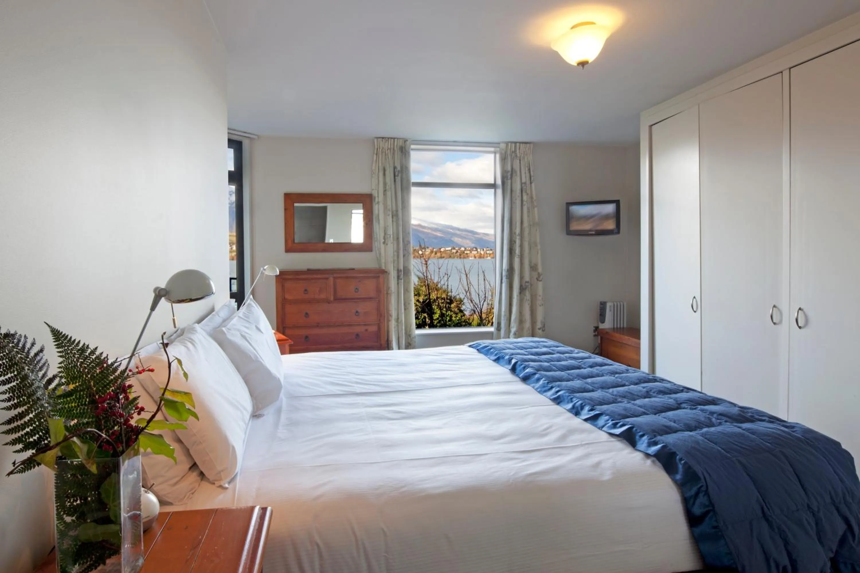 Bed in Spinnaker Bay Apartments