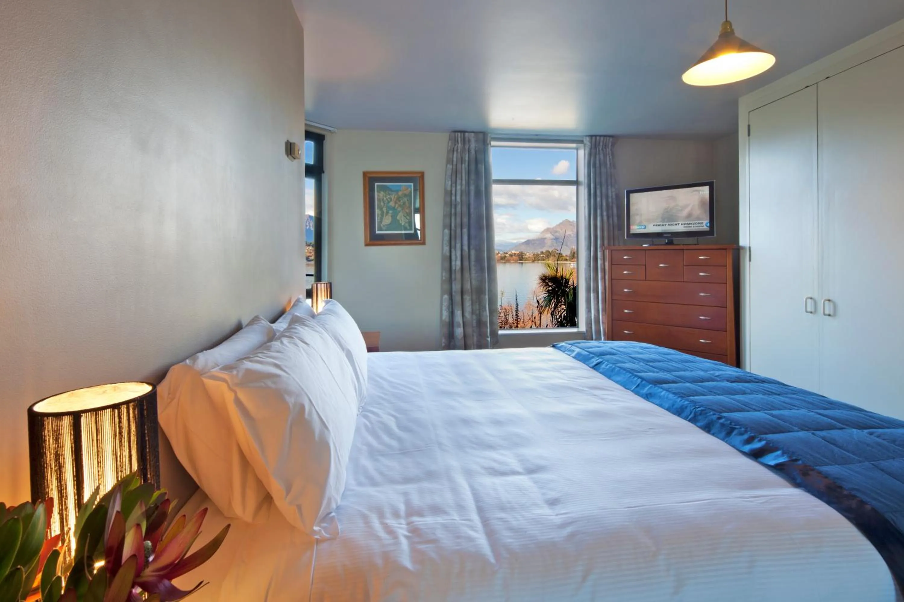 Bed in Spinnaker Bay Apartments