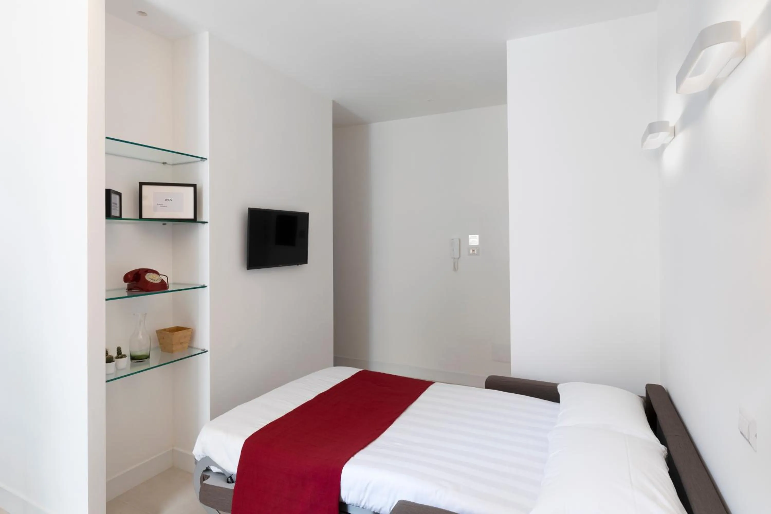 Bed in Acate81 Lifestyle Apartment