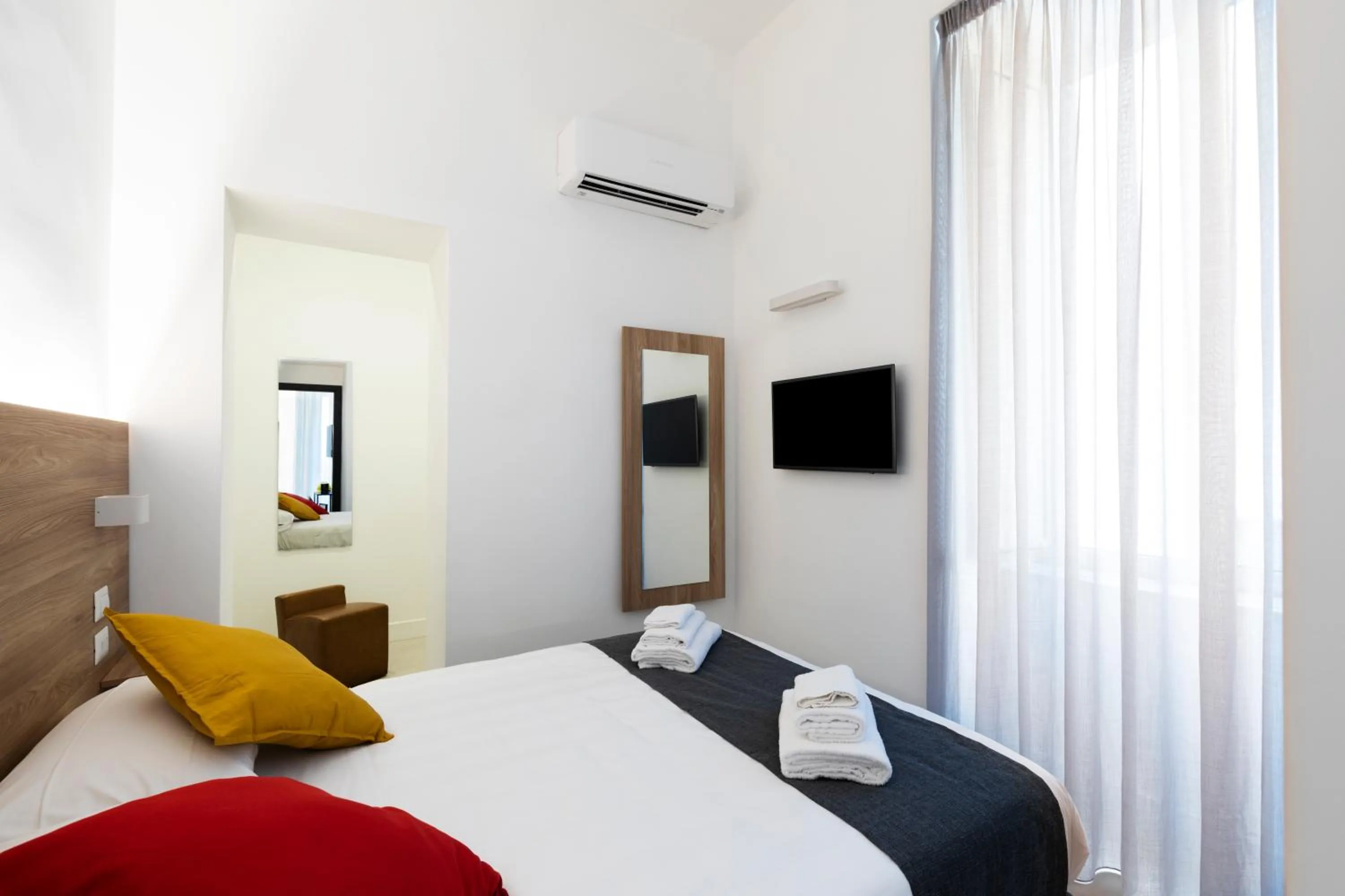 Bed in Acate81 Lifestyle Apartment