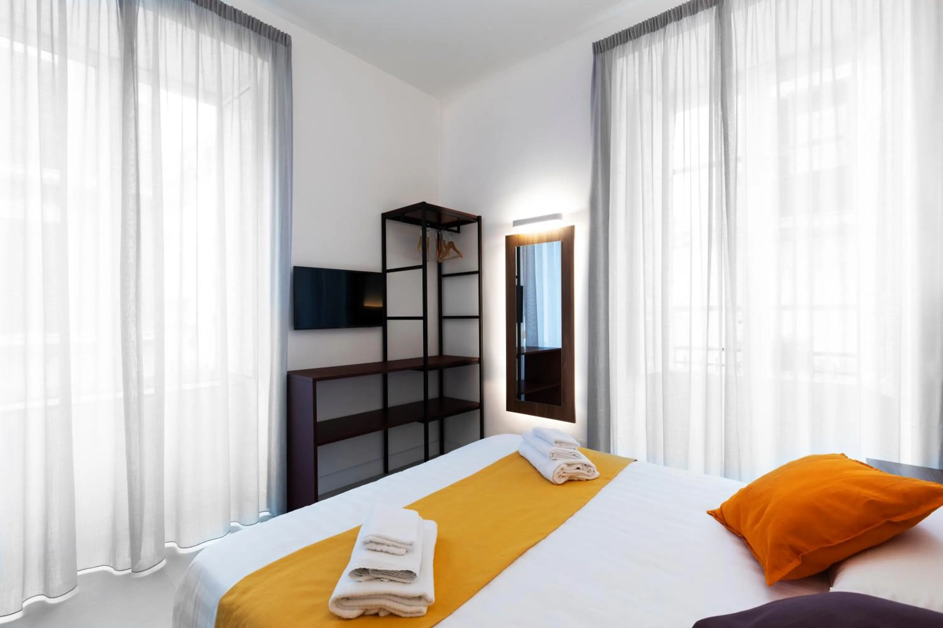 Bed in Acate81 Lifestyle Apartment