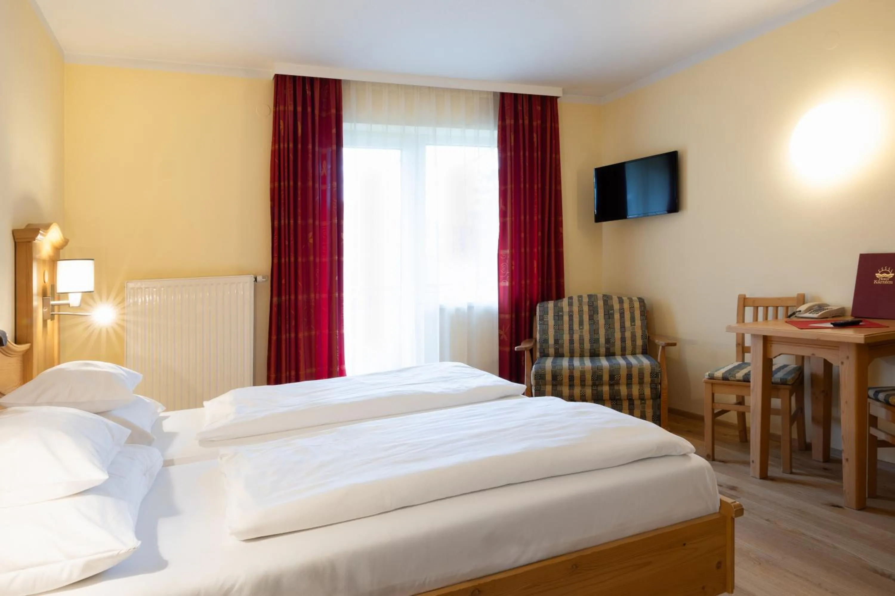 Bed in Hotel Kärnten