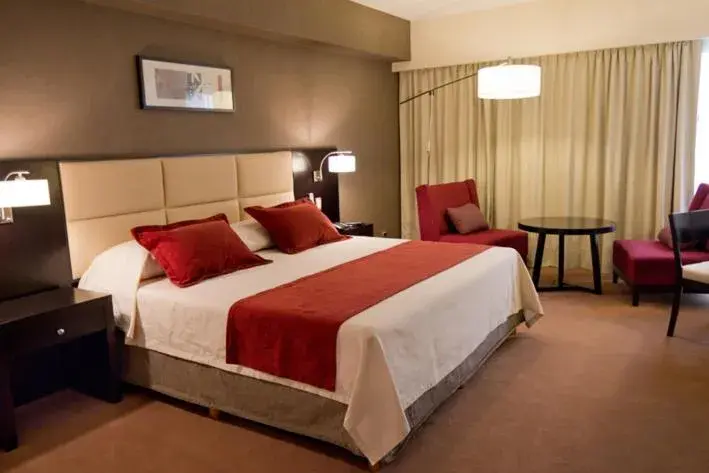 Bed in Howard Johnson Hotel And Casino Formosa