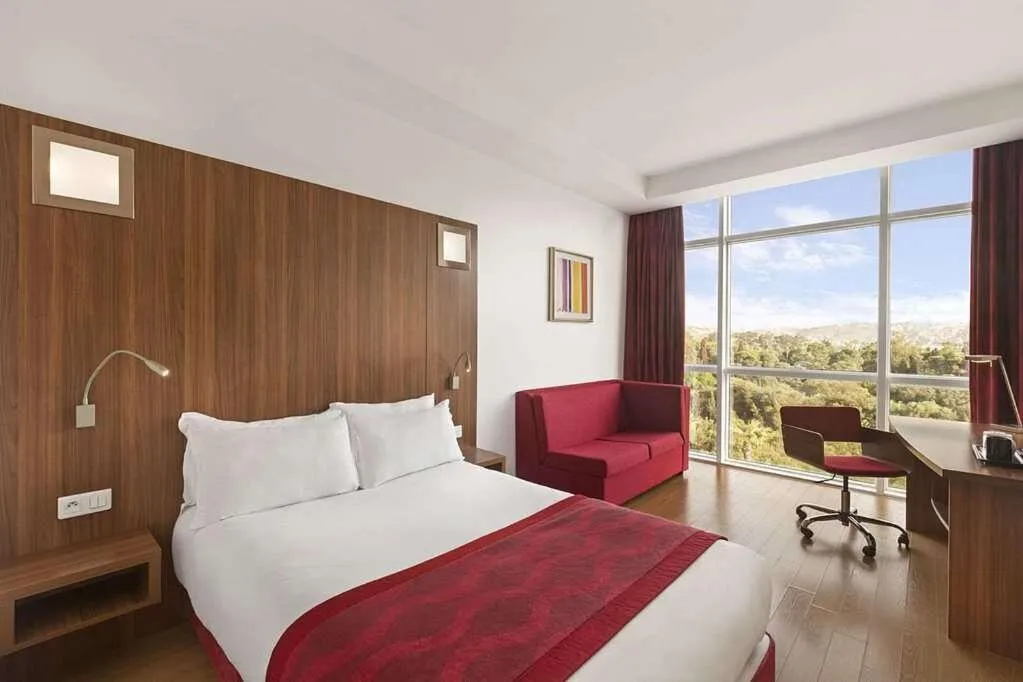 Bed in Ramada Encore By Wyndham Tangier