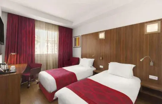 Bed in Ramada Encore By Wyndham Tangier Bed in Ramada Encore By Wyndham Tangier