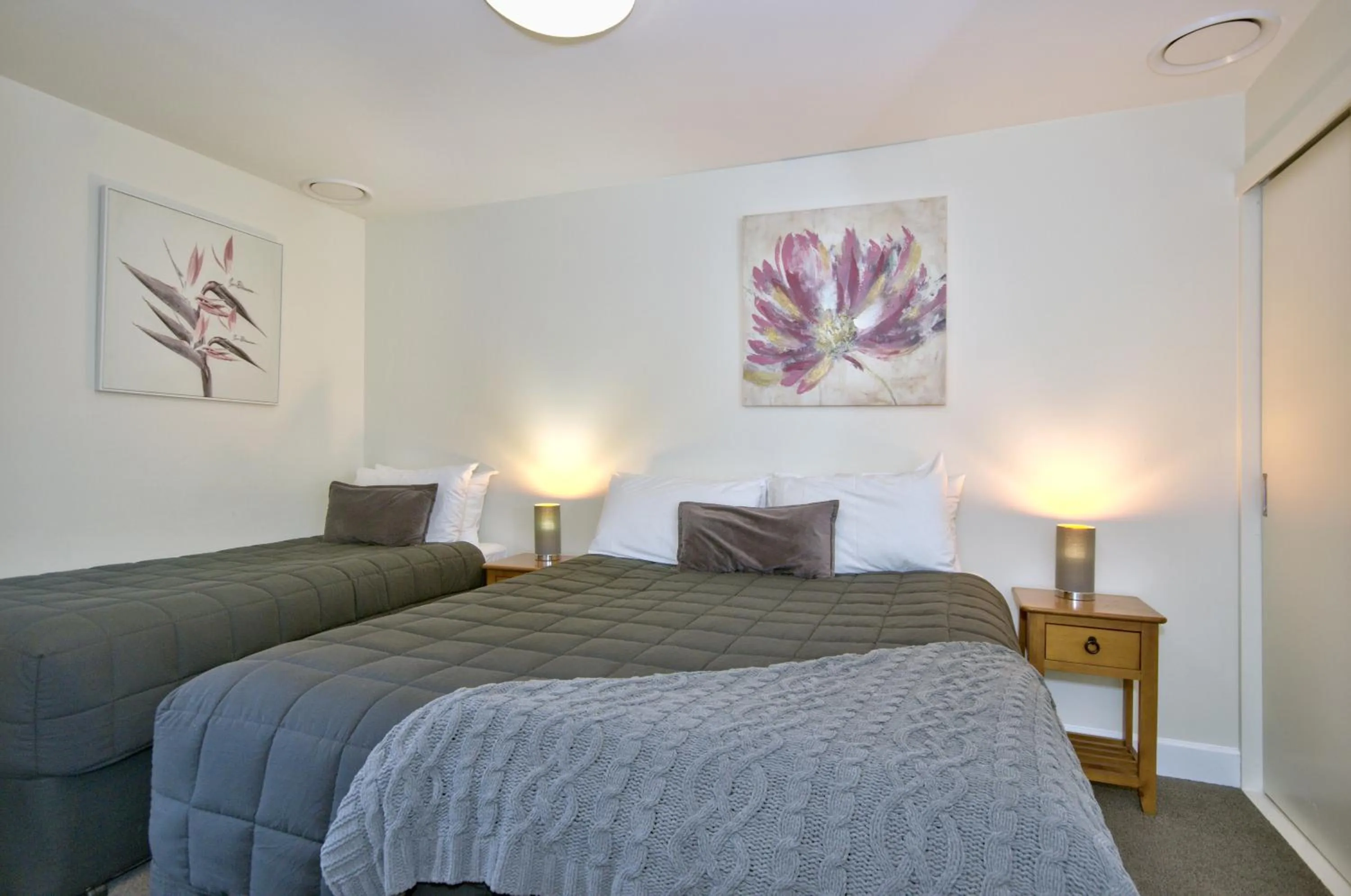 Bed in The Whistler Holiday Apartments