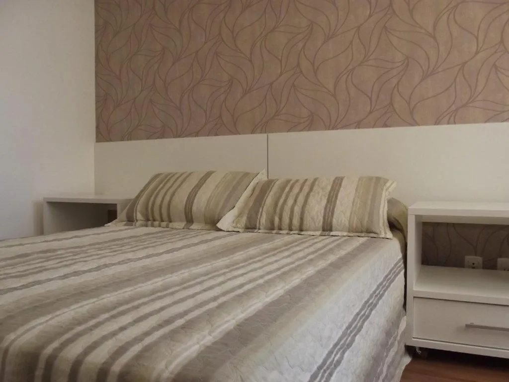 Bed in L'Hirondelle Flat Service