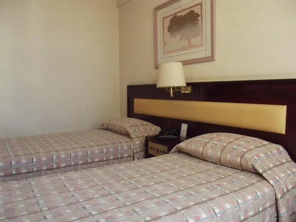 Bedroom, Bed in L'Hirondelle Flat Service