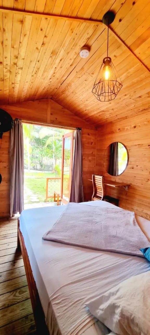 Bed in Blue Mango Beach Hotel