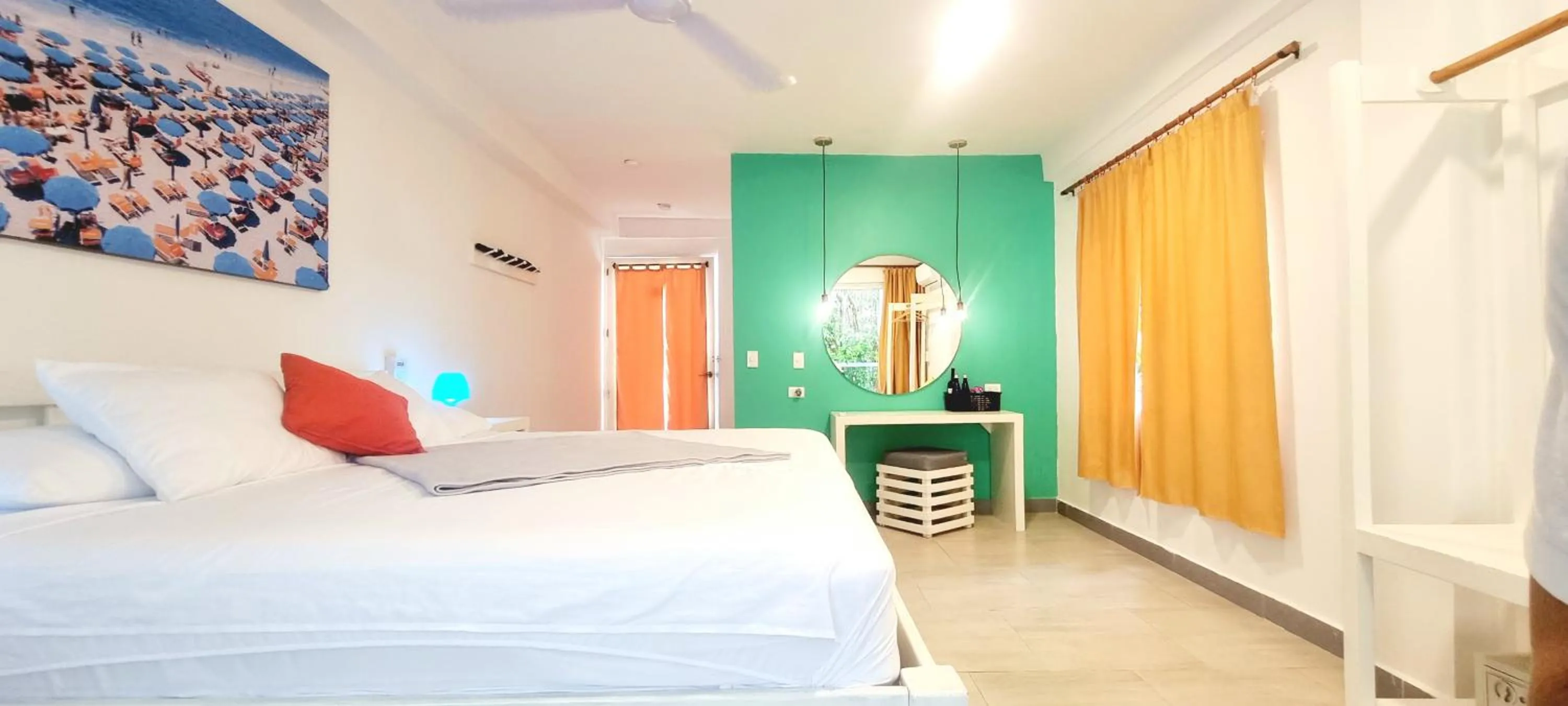 Bed in Blue Mango Beach Hotel