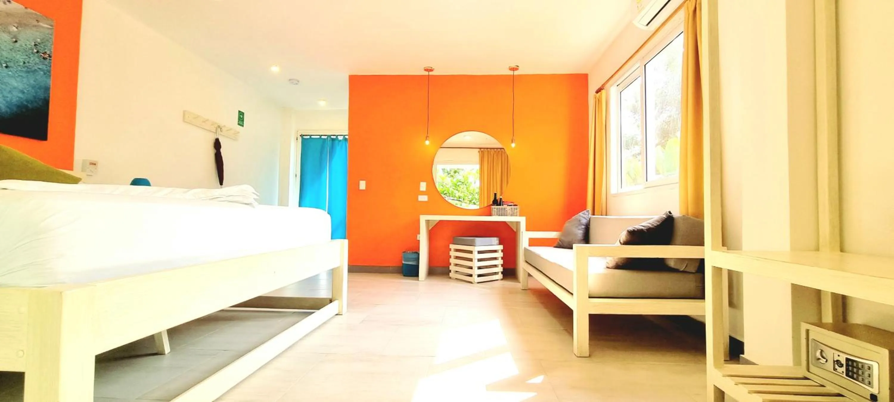 Bed in Blue Mango Beach Hotel