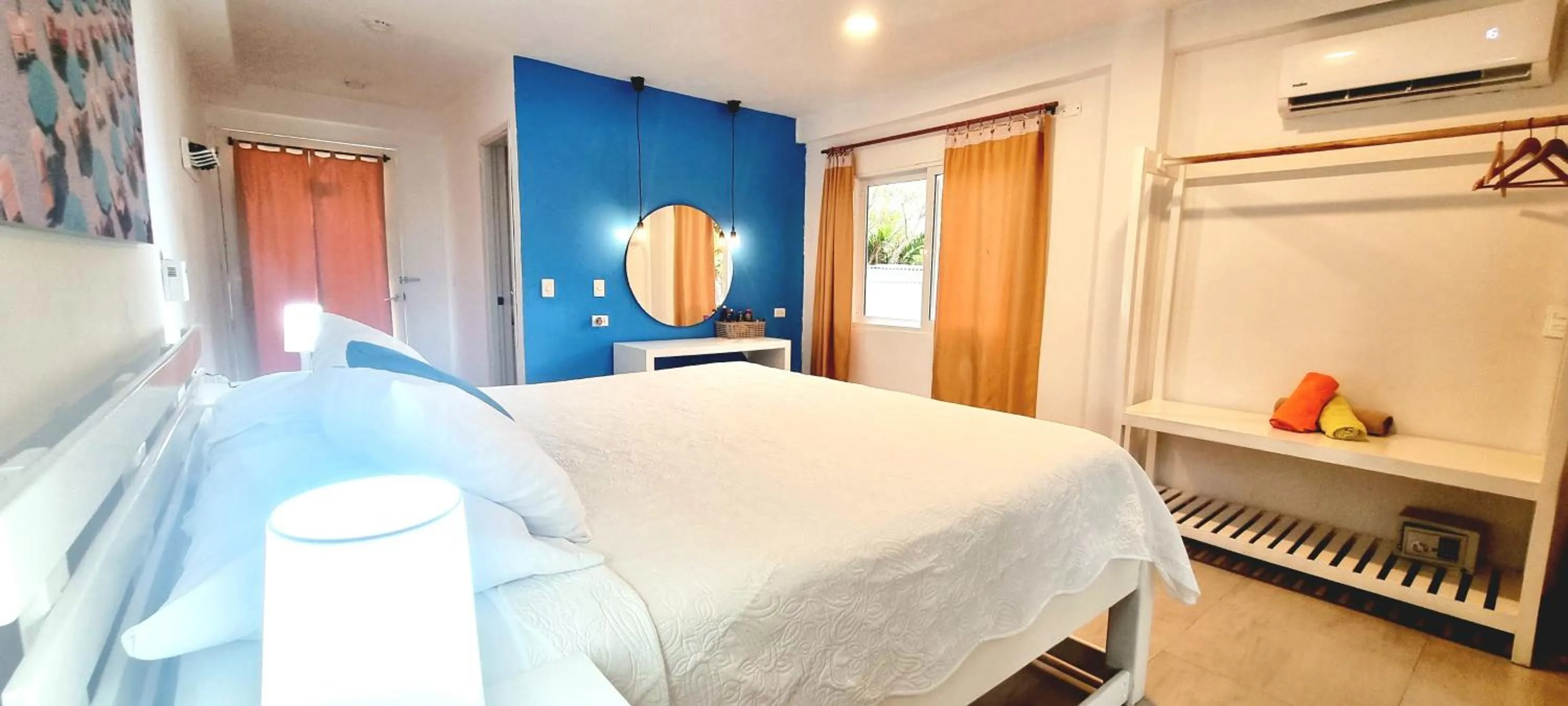 Bed in Blue Mango Beach Hotel