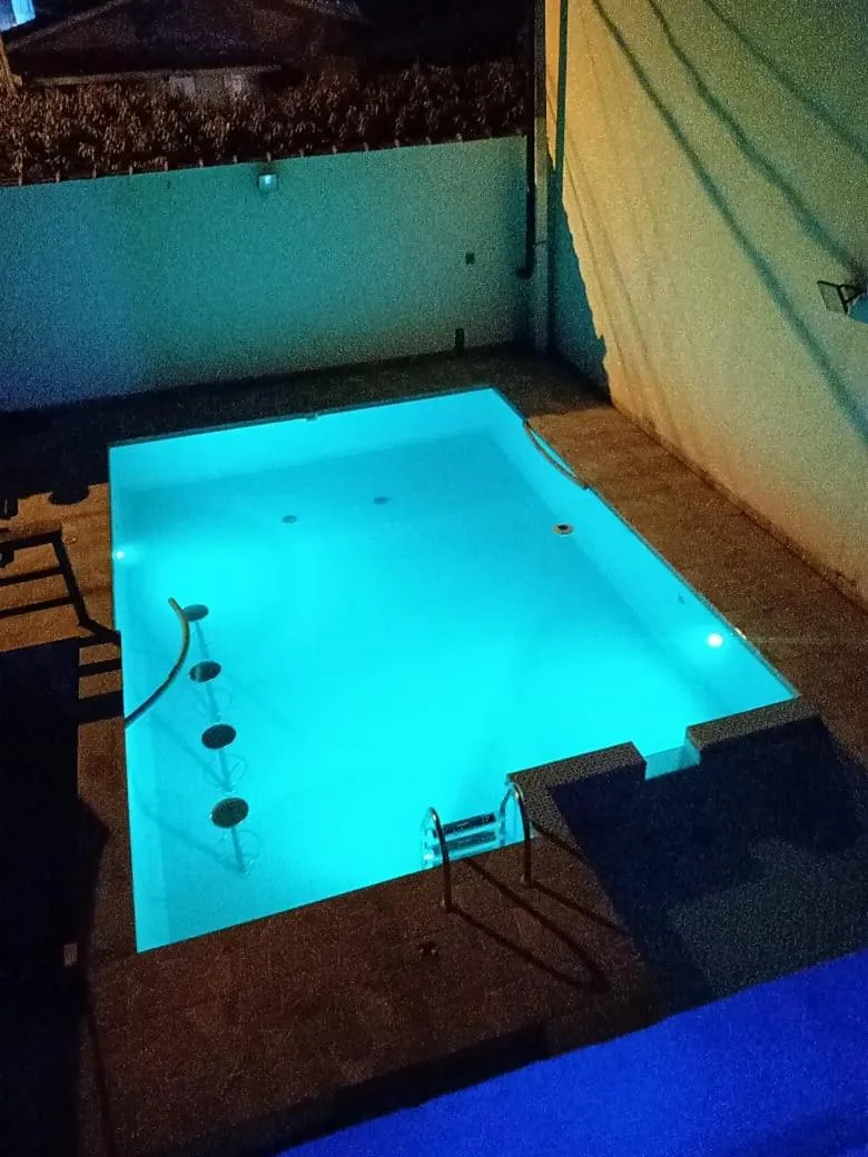Swimming pool in Pousada Recanto das Margaridas