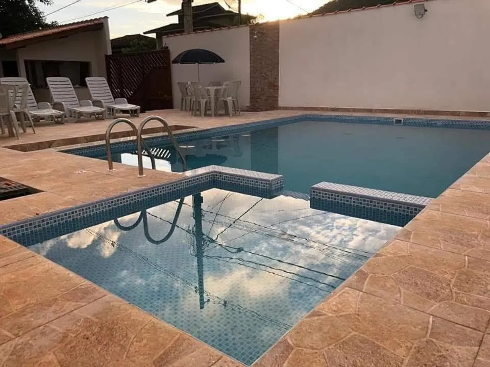 Swimming pool in Pousada Recanto das Margaridas