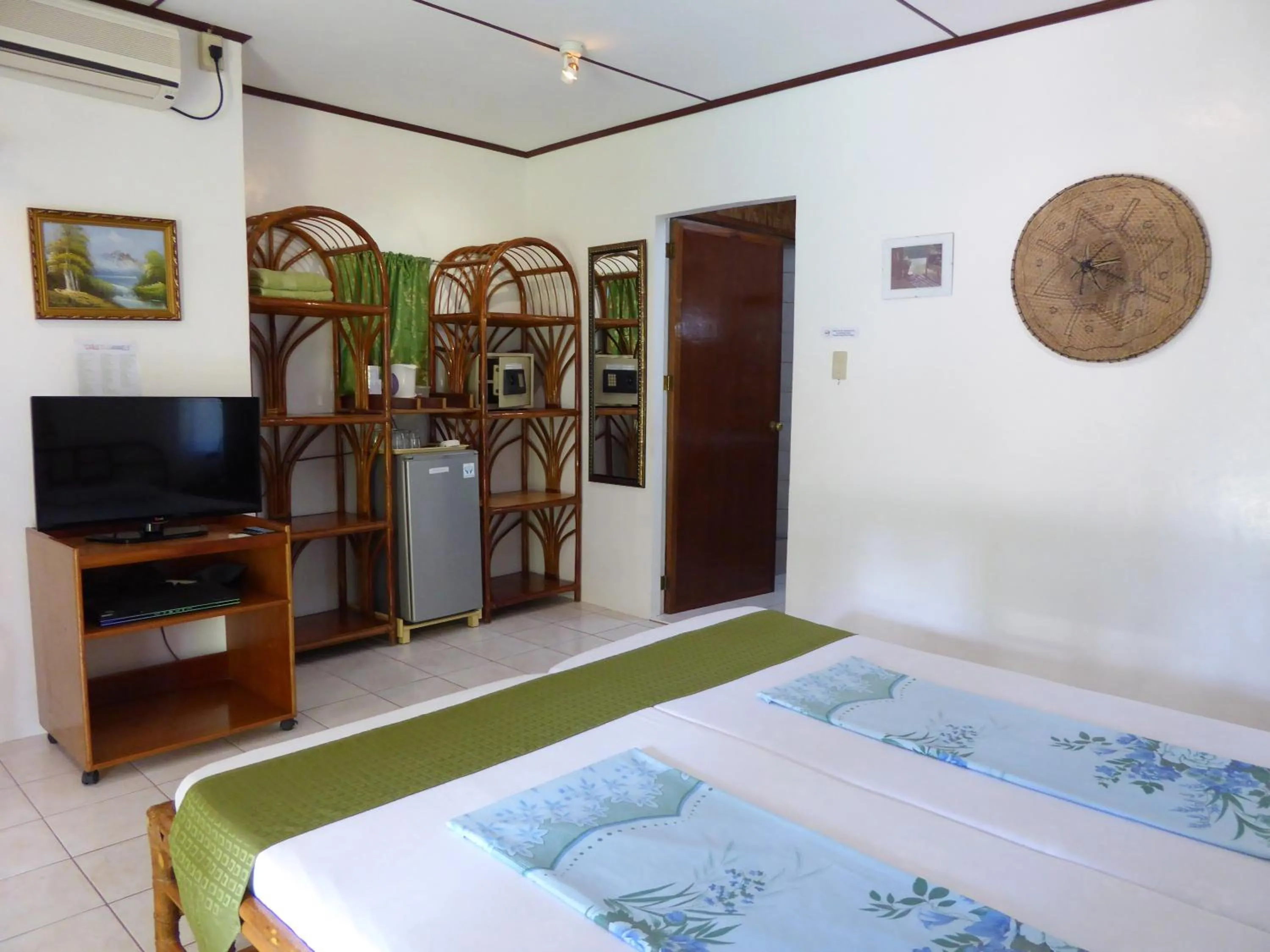 Bedroom in Marcosas Cottages Resort