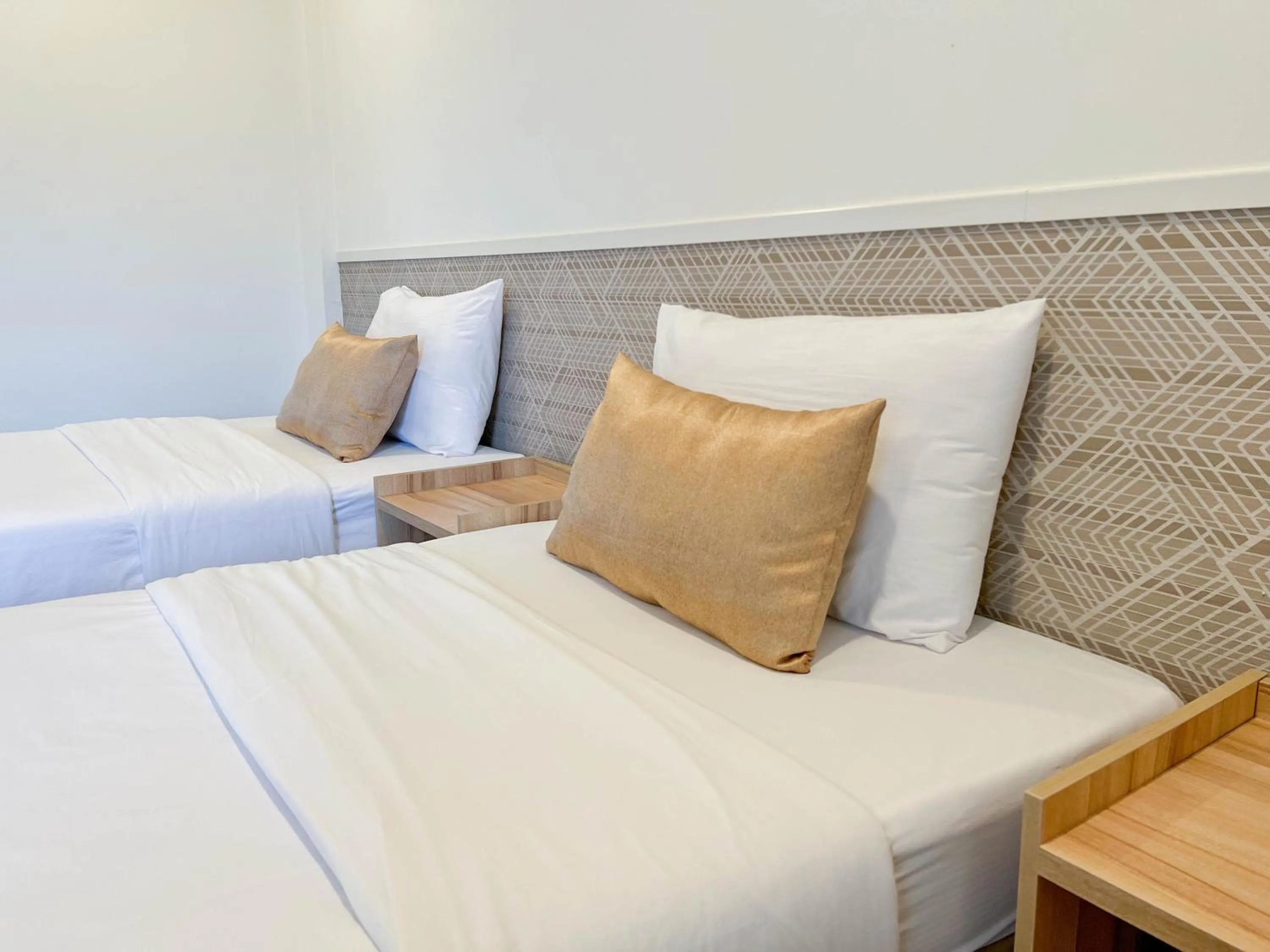 Bed in Inspire House Hotel