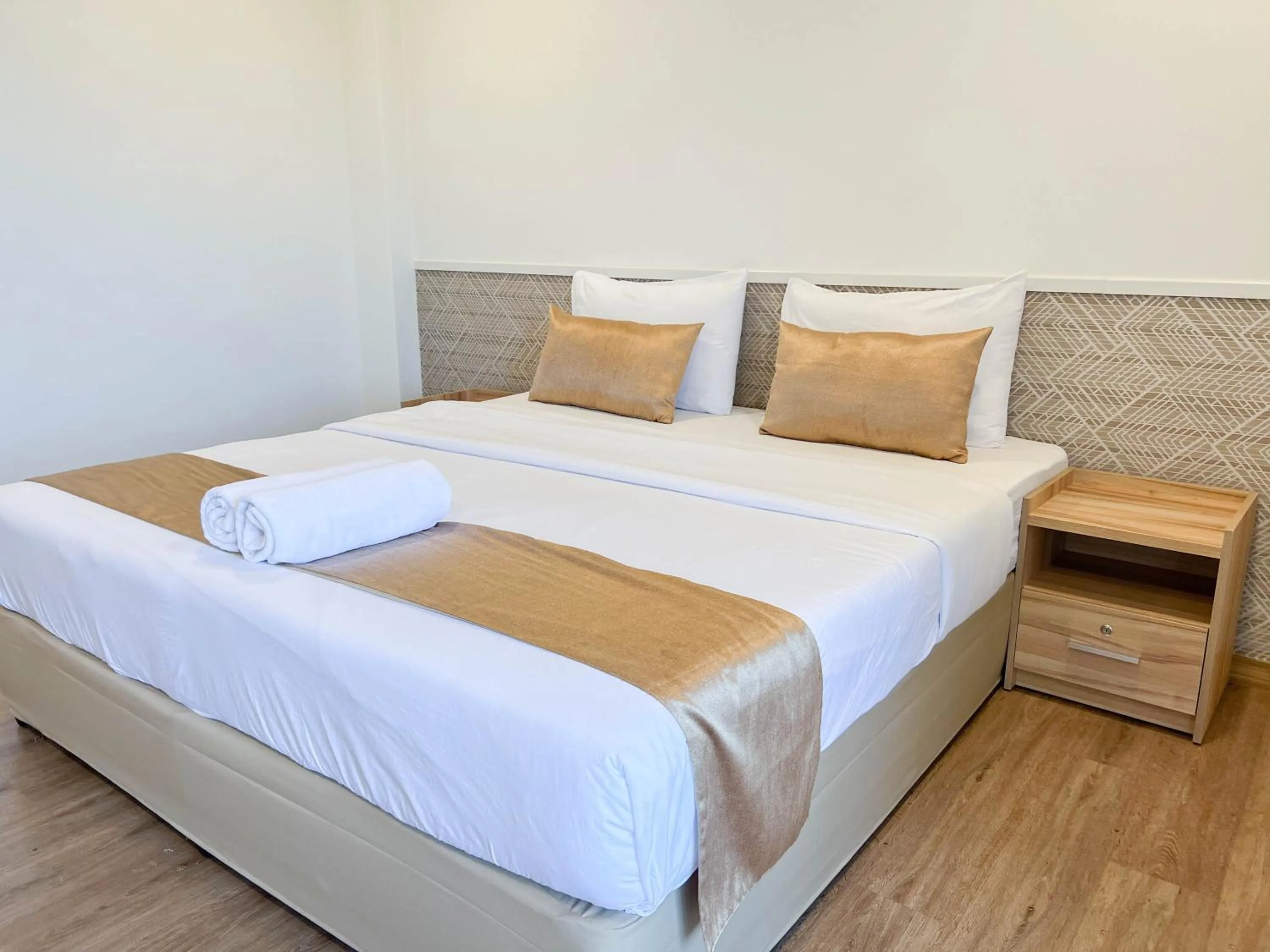 Bed in Inspire House Hotel