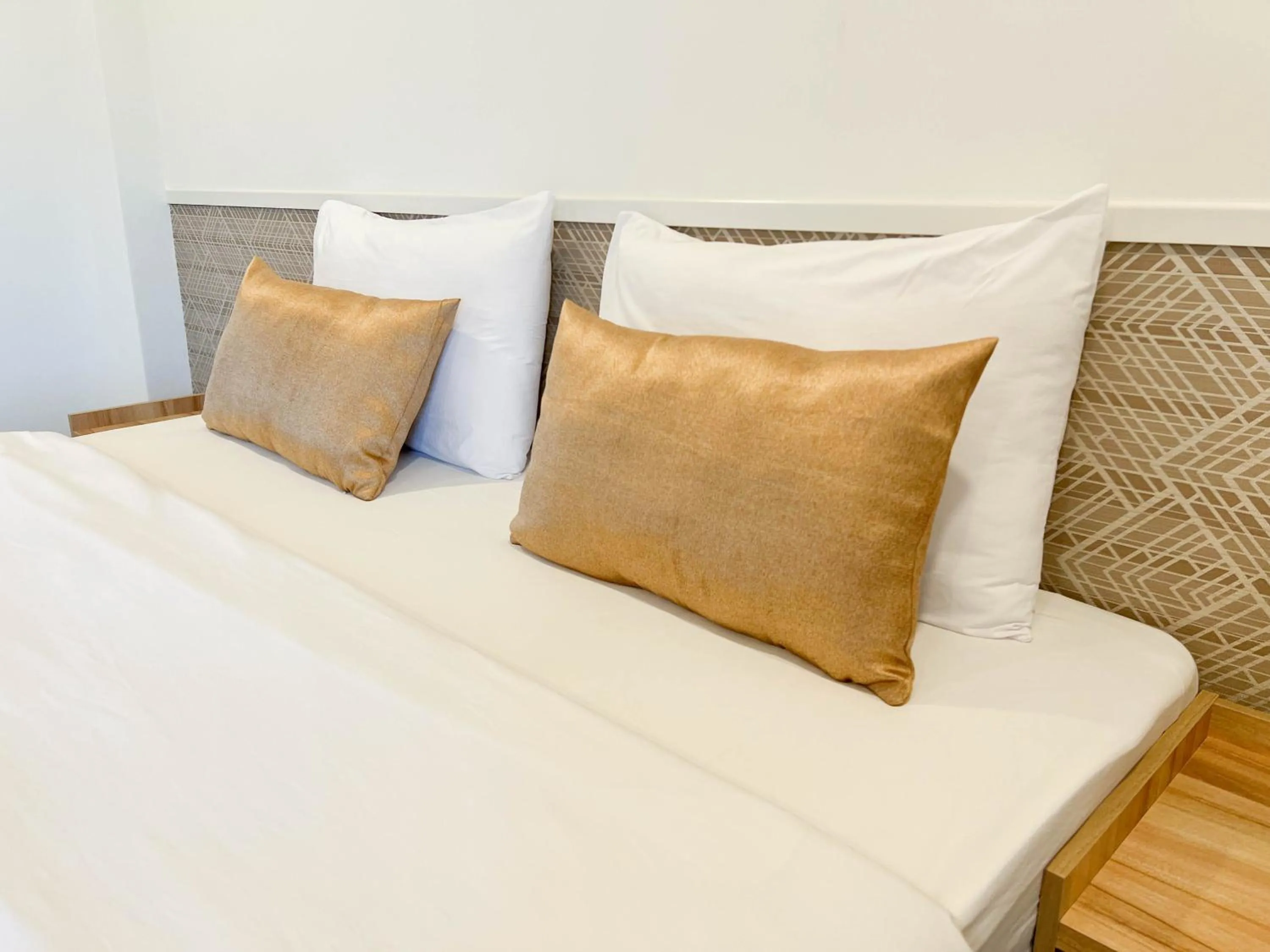 Bed in Inspire House Hotel