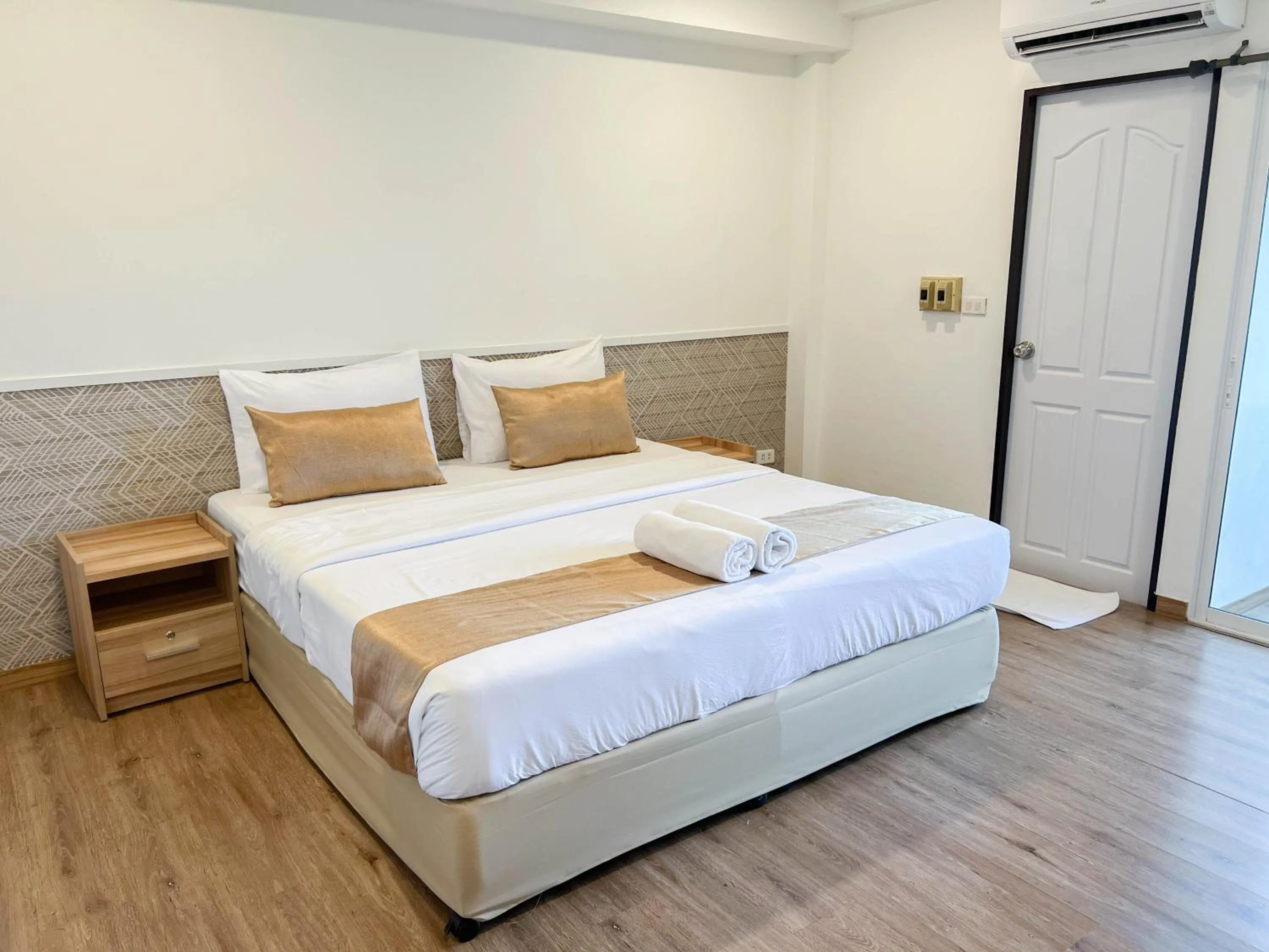 Bed in Inspire House Hotel