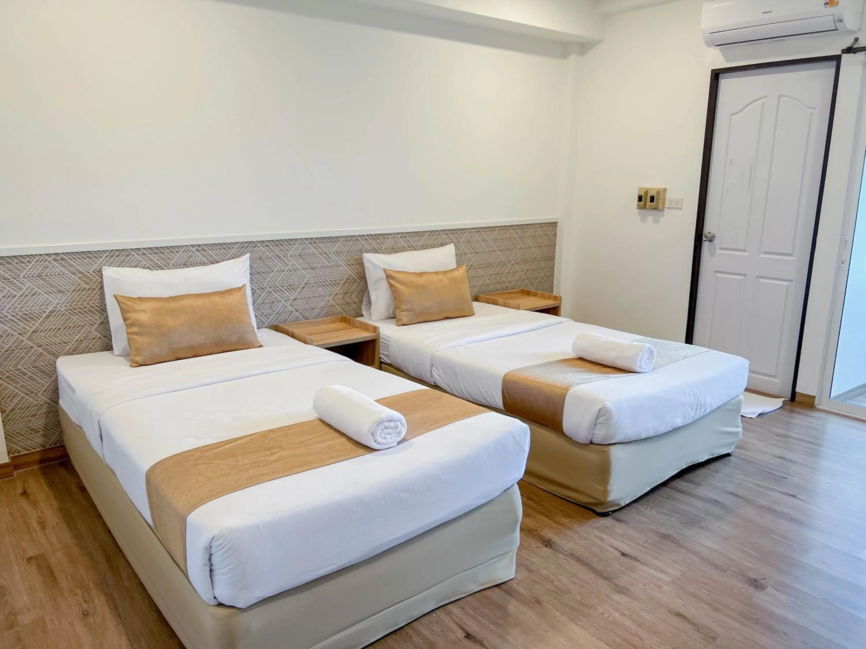 Bed in Inspire House Hotel