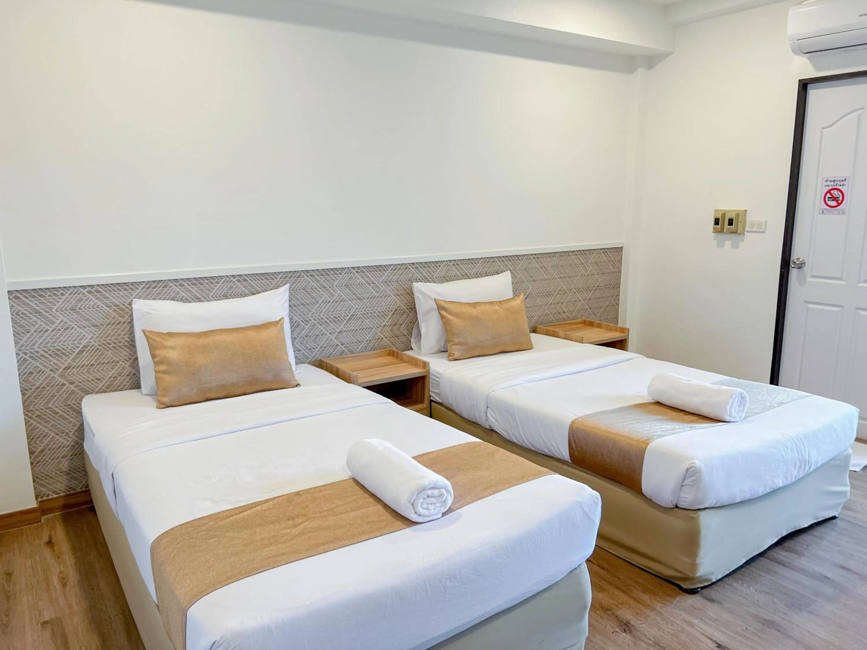 Bed in Inspire House Hotel