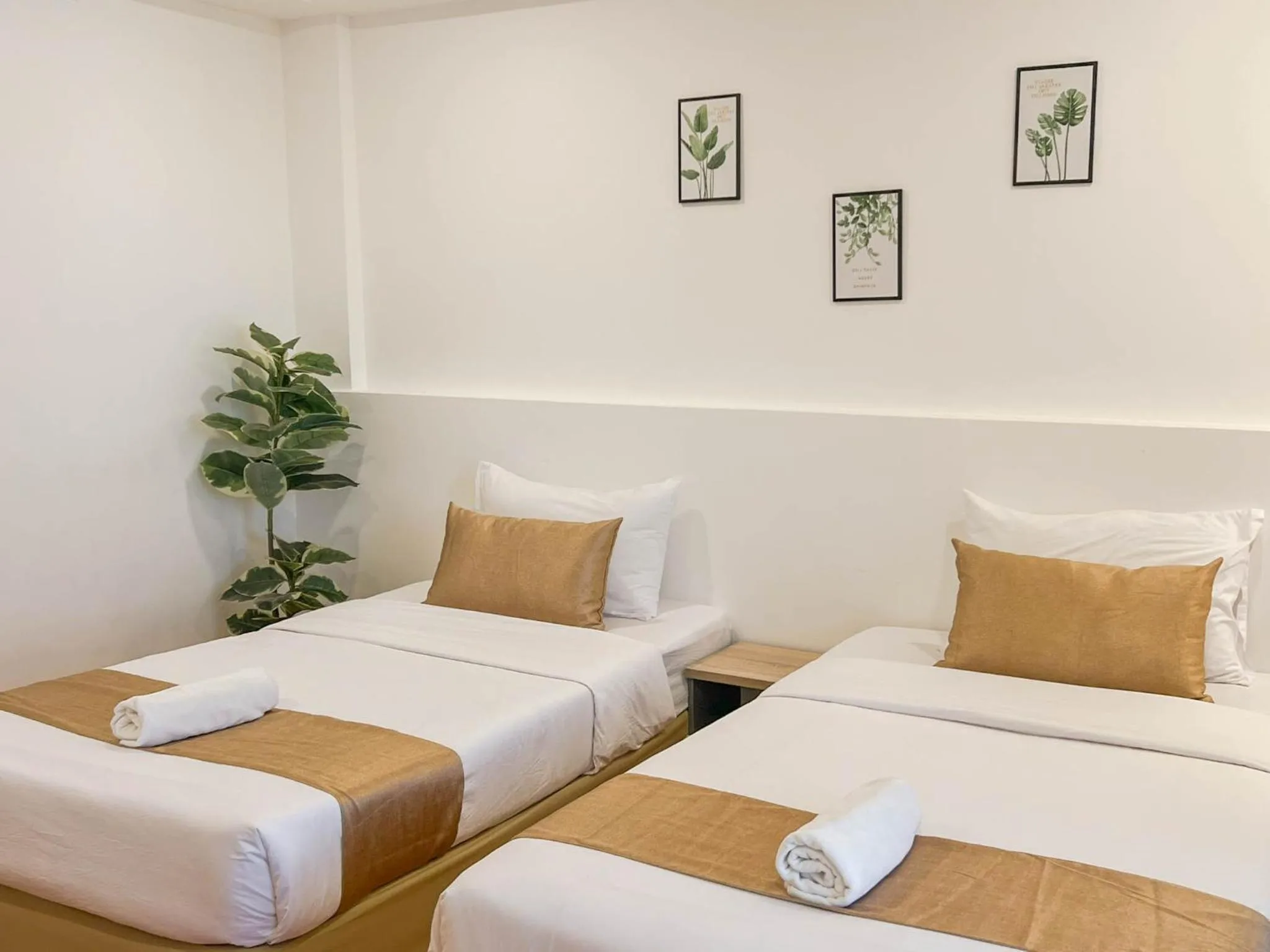 Bed in Inspire House Hotel