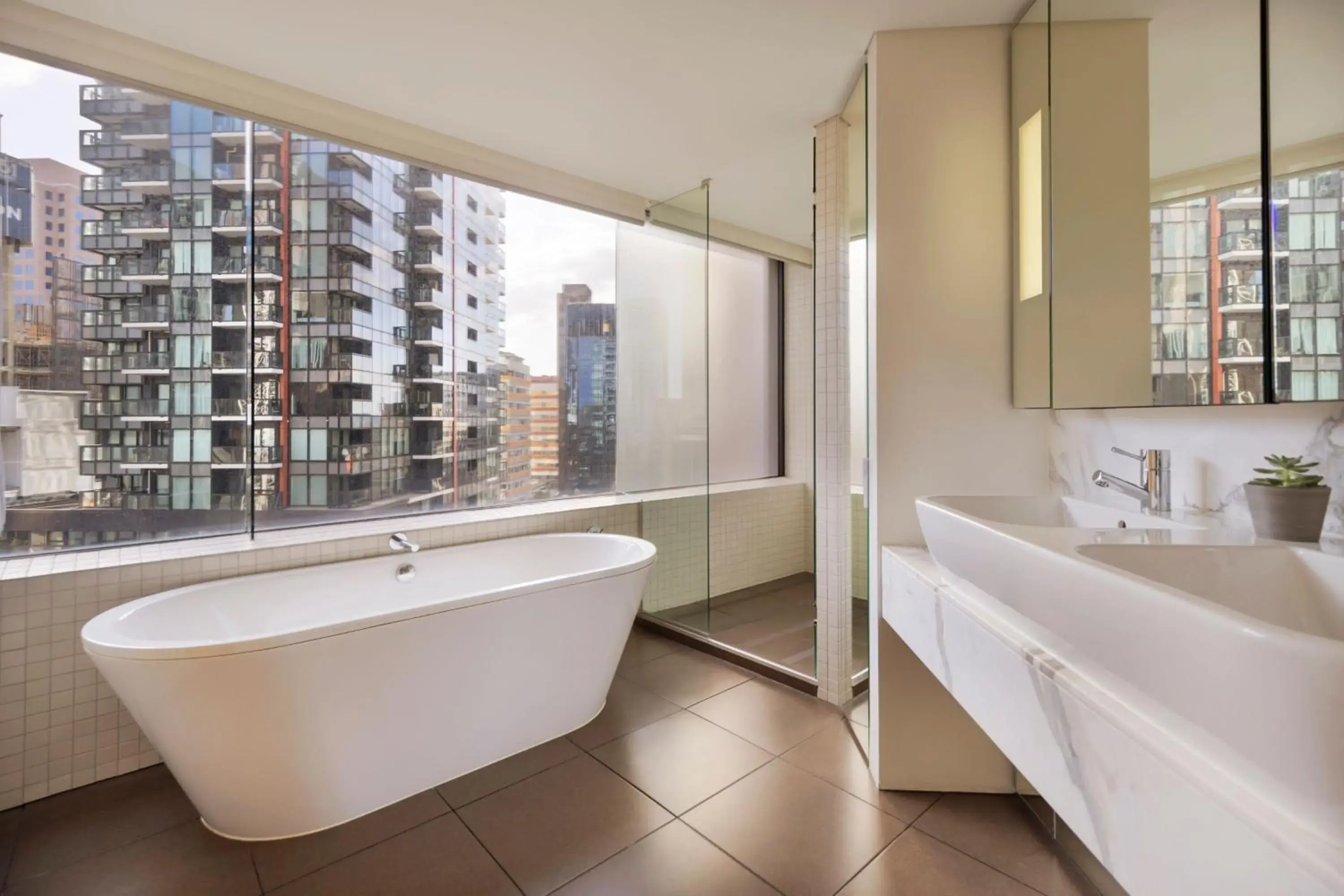 Bedroom, Bathroom in JW Marriott Auckland