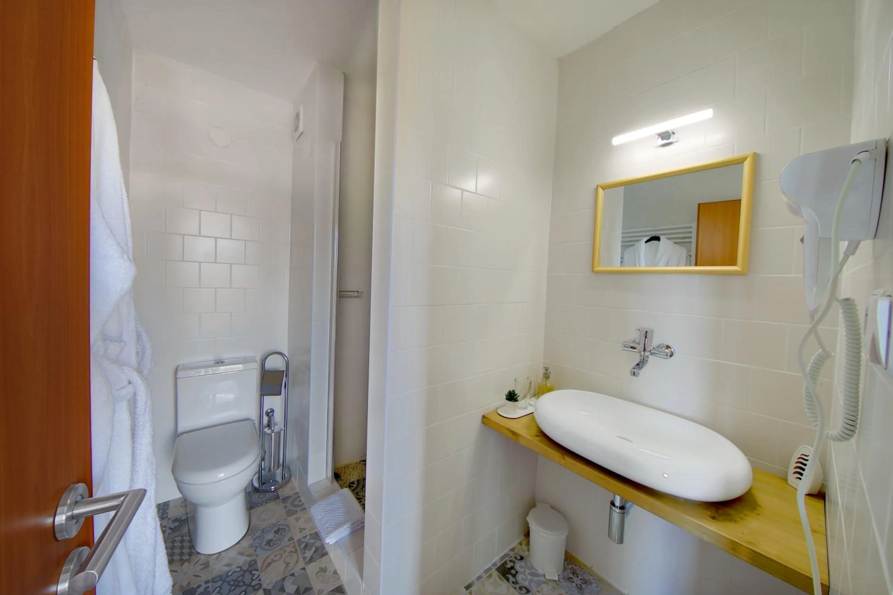 Bathroom in Hotel BRADA