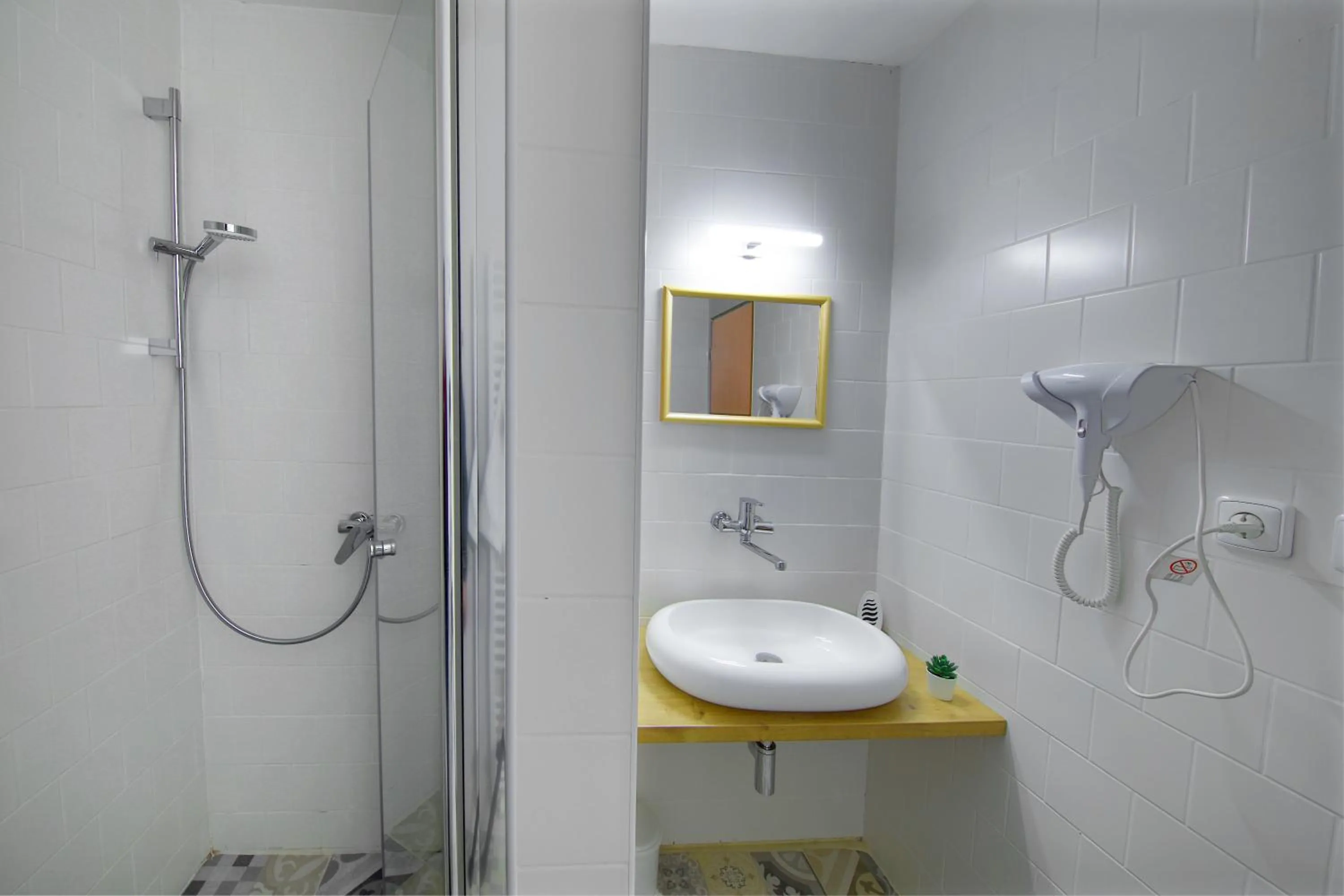 Bathroom in Hotel BRADA