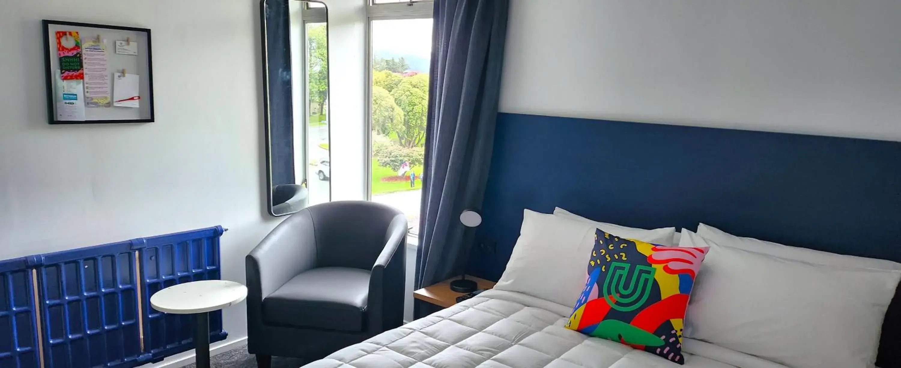 Queen Room with Shared Bathroom in Urban Lounge Sleepery, SureStay Collection by BW Queen Room with Shared Bathroom in Urban Lounge Sleepery, SureStay Collection by BW