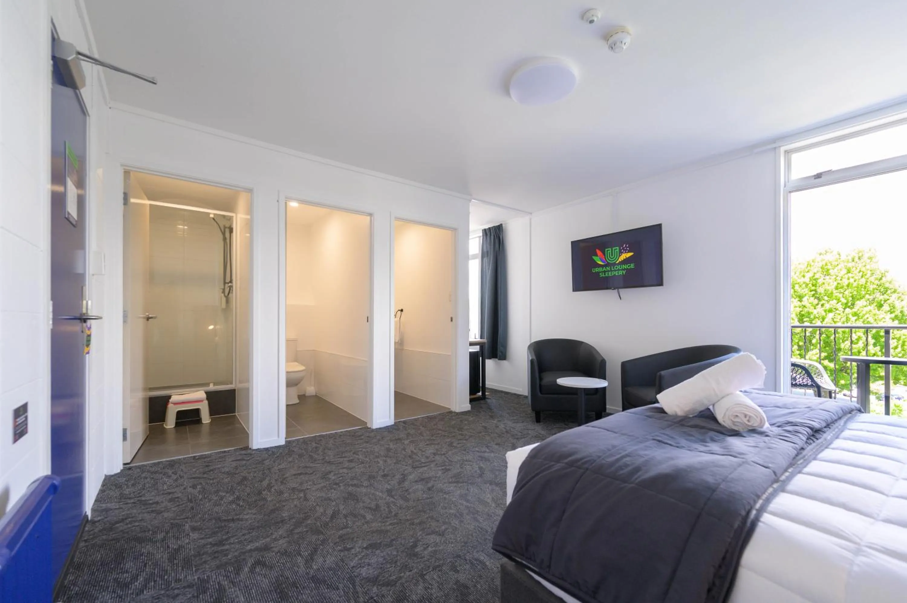 Bathroom, Bed in Urban Lounge Sleepery, SureStay Collection by BW