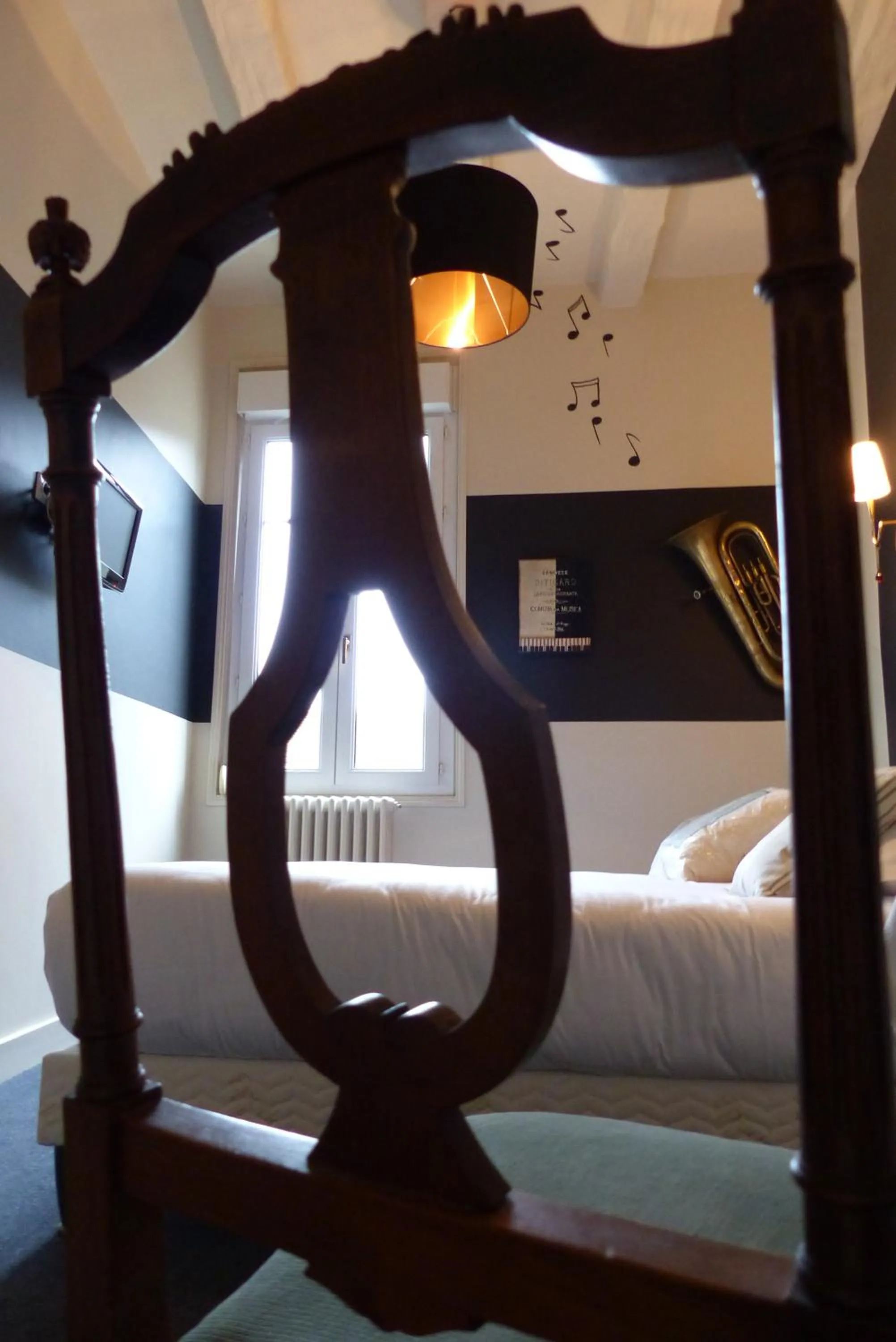Decorative detail, Bed in Logis Hotel Restaurant Le Cheval Blanc