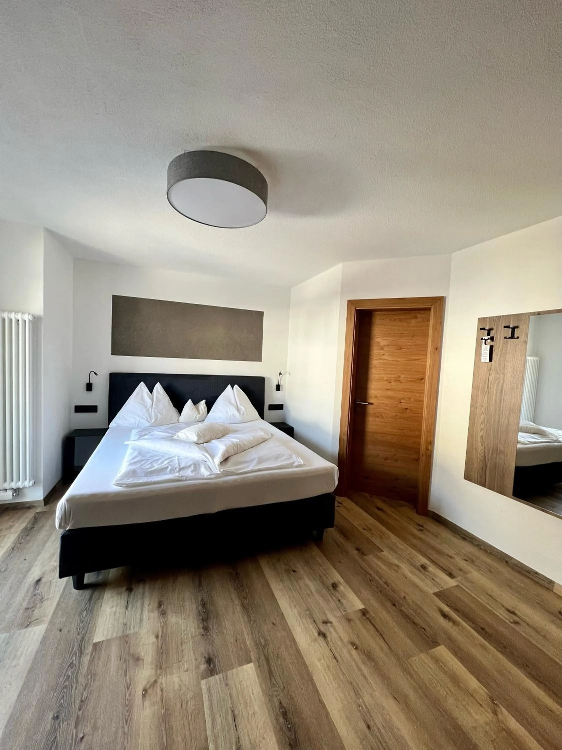 Bedroom in Schmalzlhof Hotel & Apartments