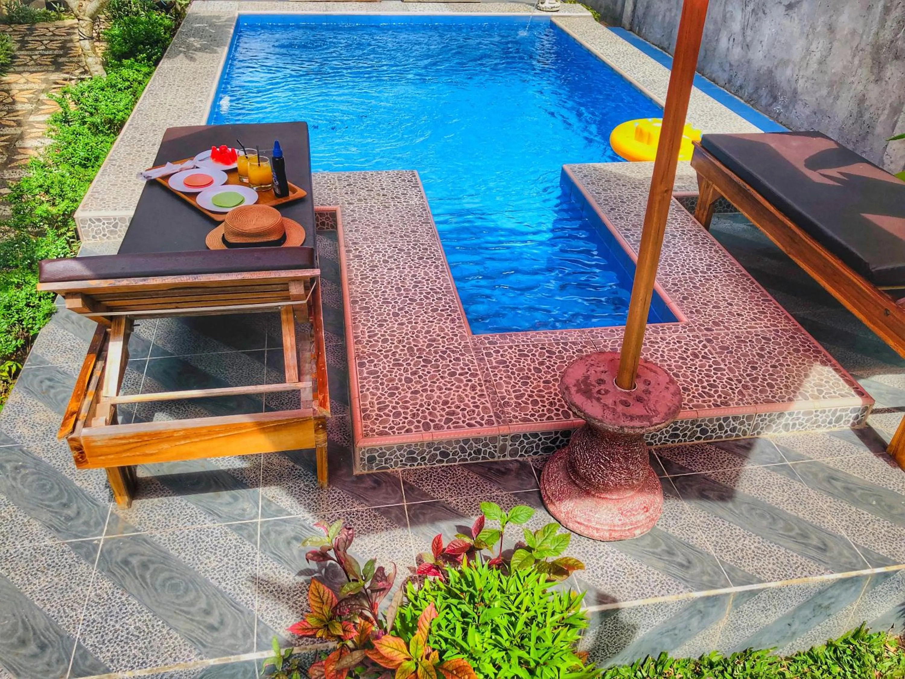 Swimming pool in Madeira Inn Villa by Bukit Vista