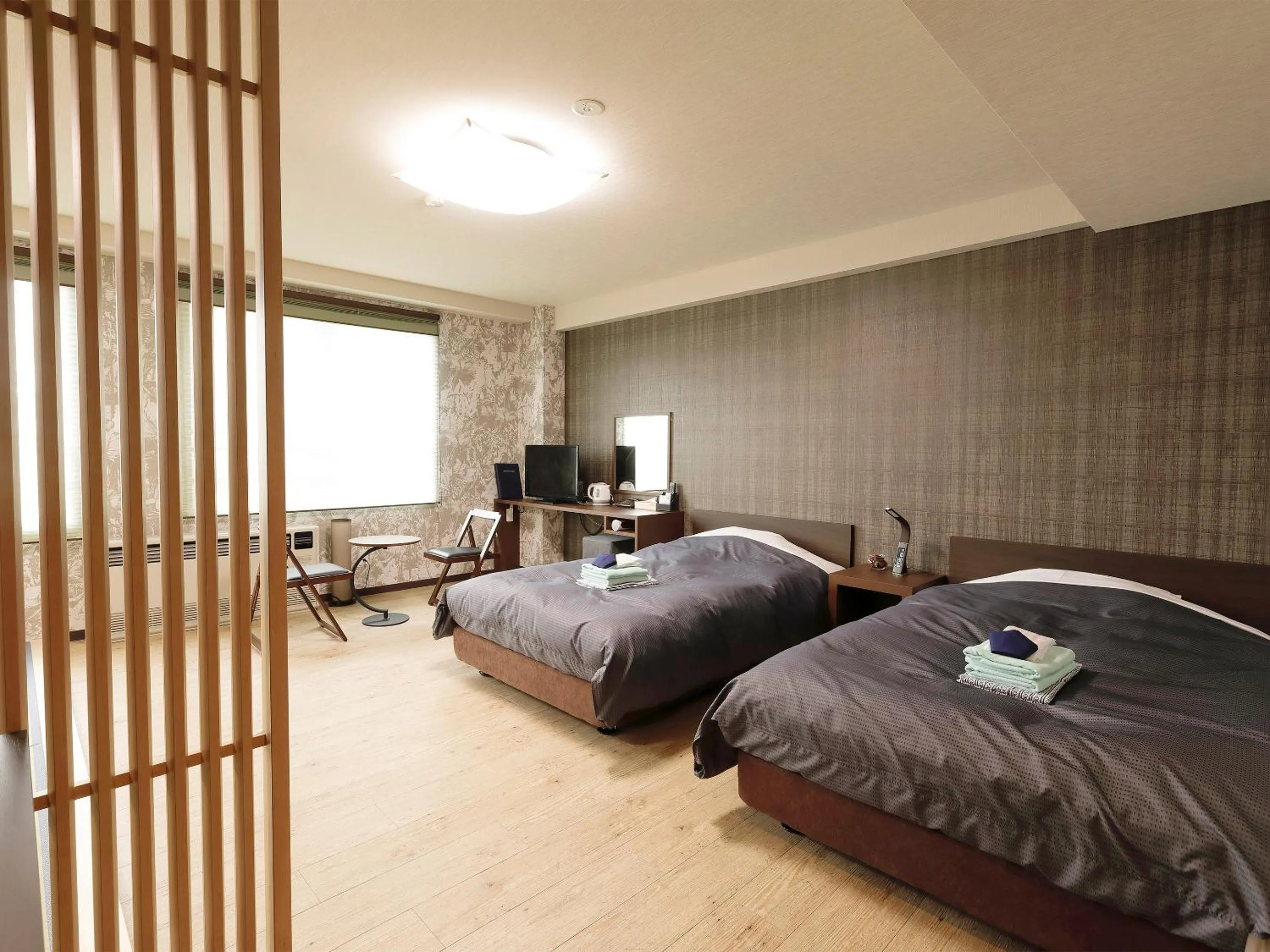 Bed in Apprising hotels GranJam Tsugaike