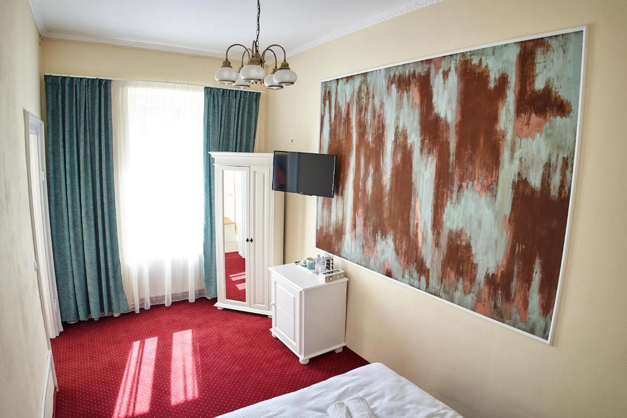 Communal lounge/ TV room, Bed in Charma Residence