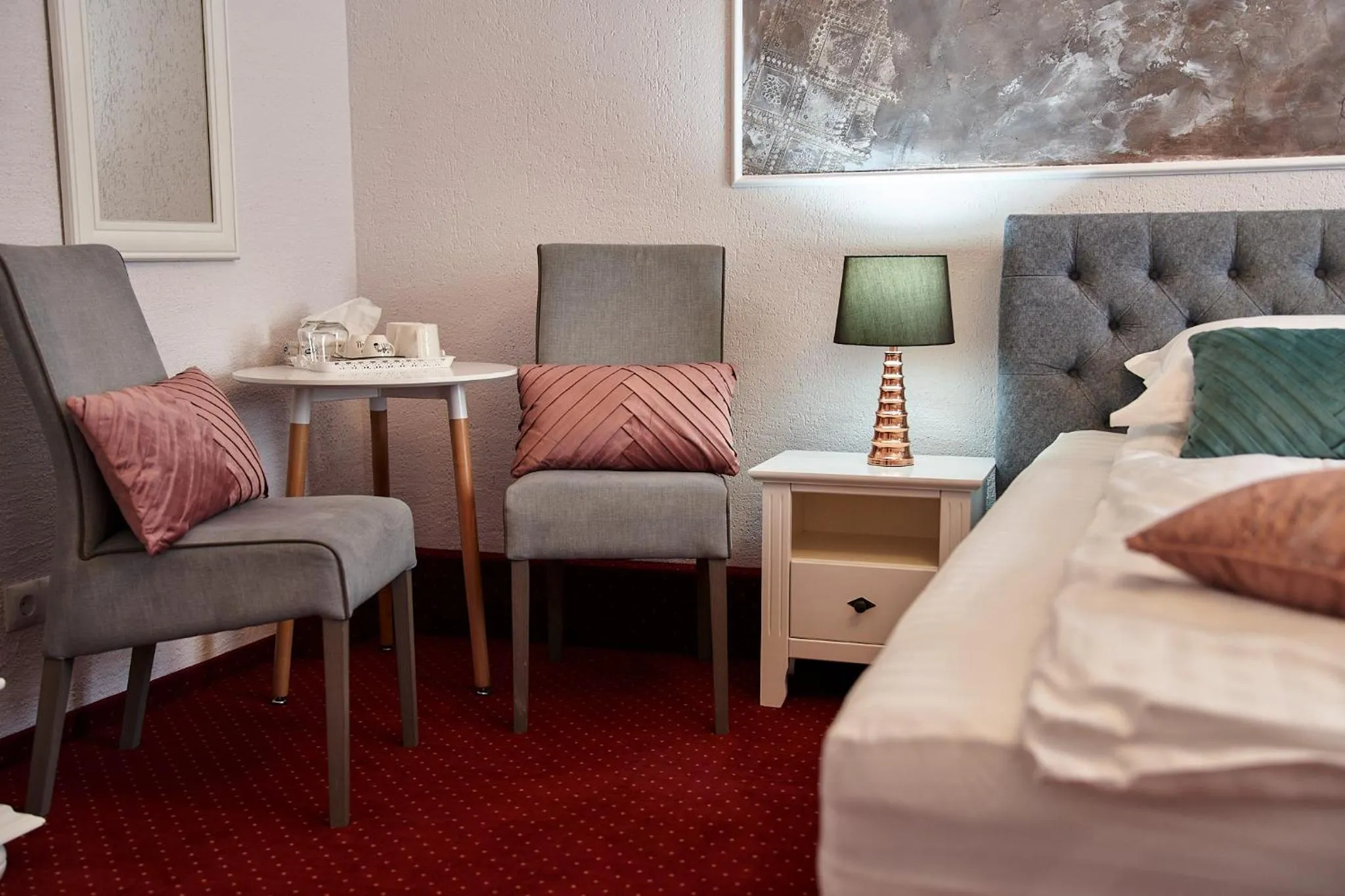 Seating area, Bed in Charma Residence