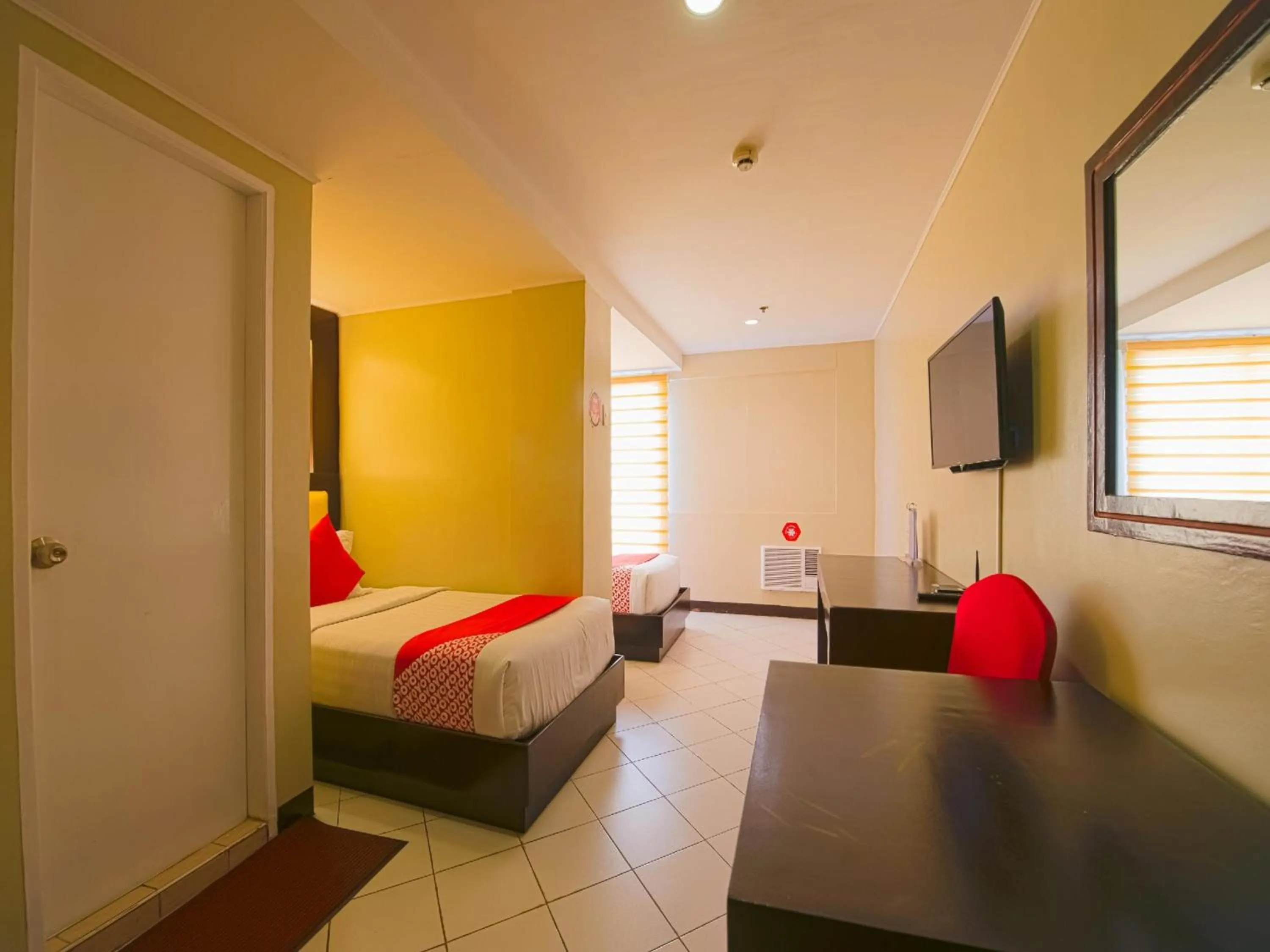 Photo of the whole room in OYO 115 Northridge Mansions