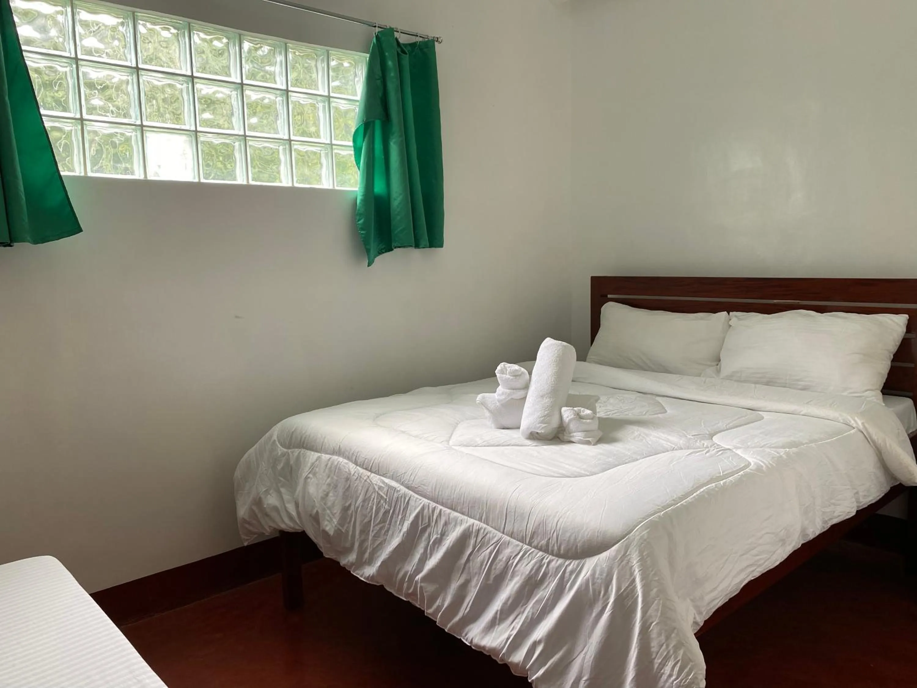 Bed in Tongatok Cliff Resort