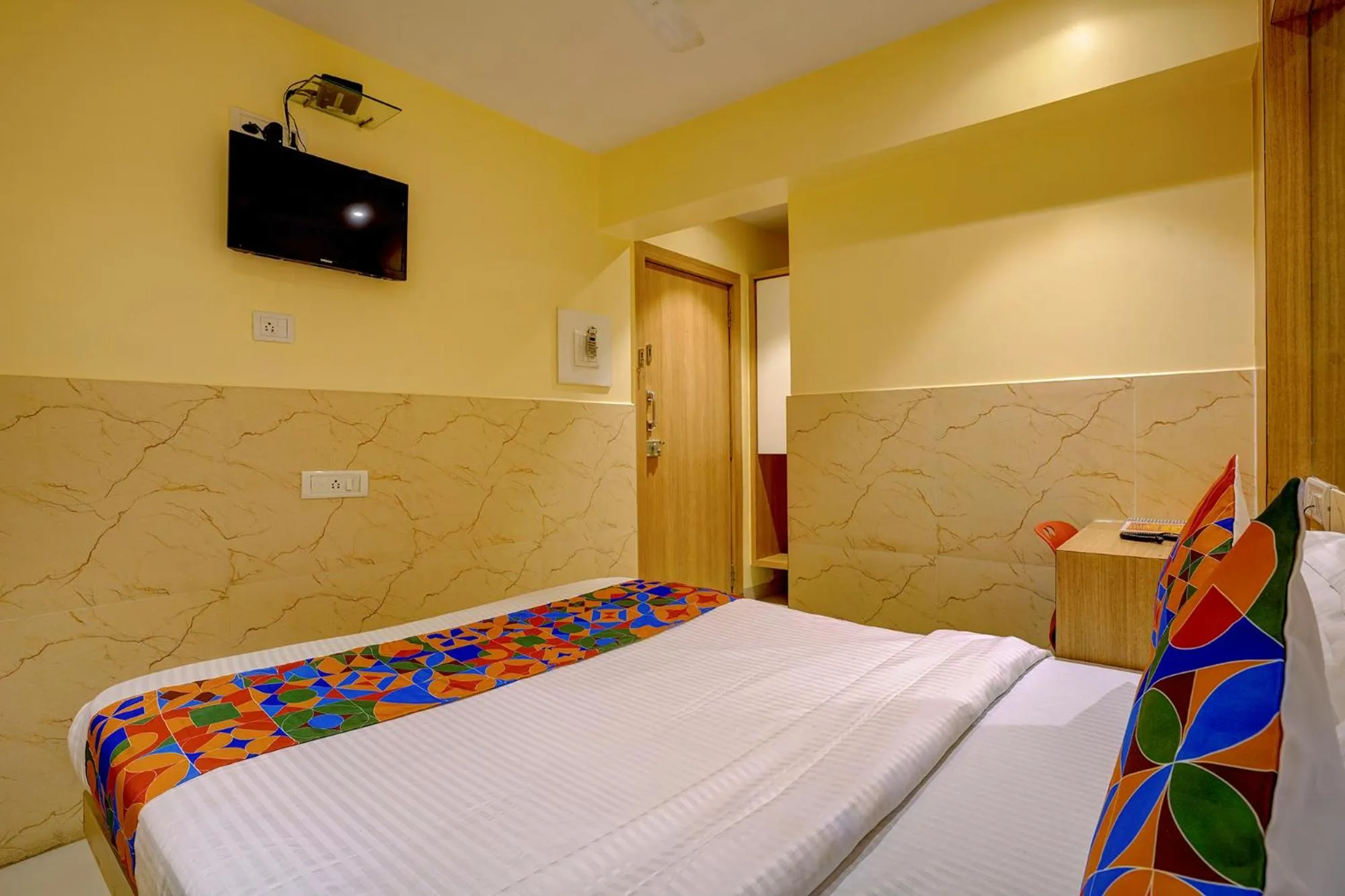 Bed in FabHotel Starwood Residency - 100M From Dr DY Patil Stadium
