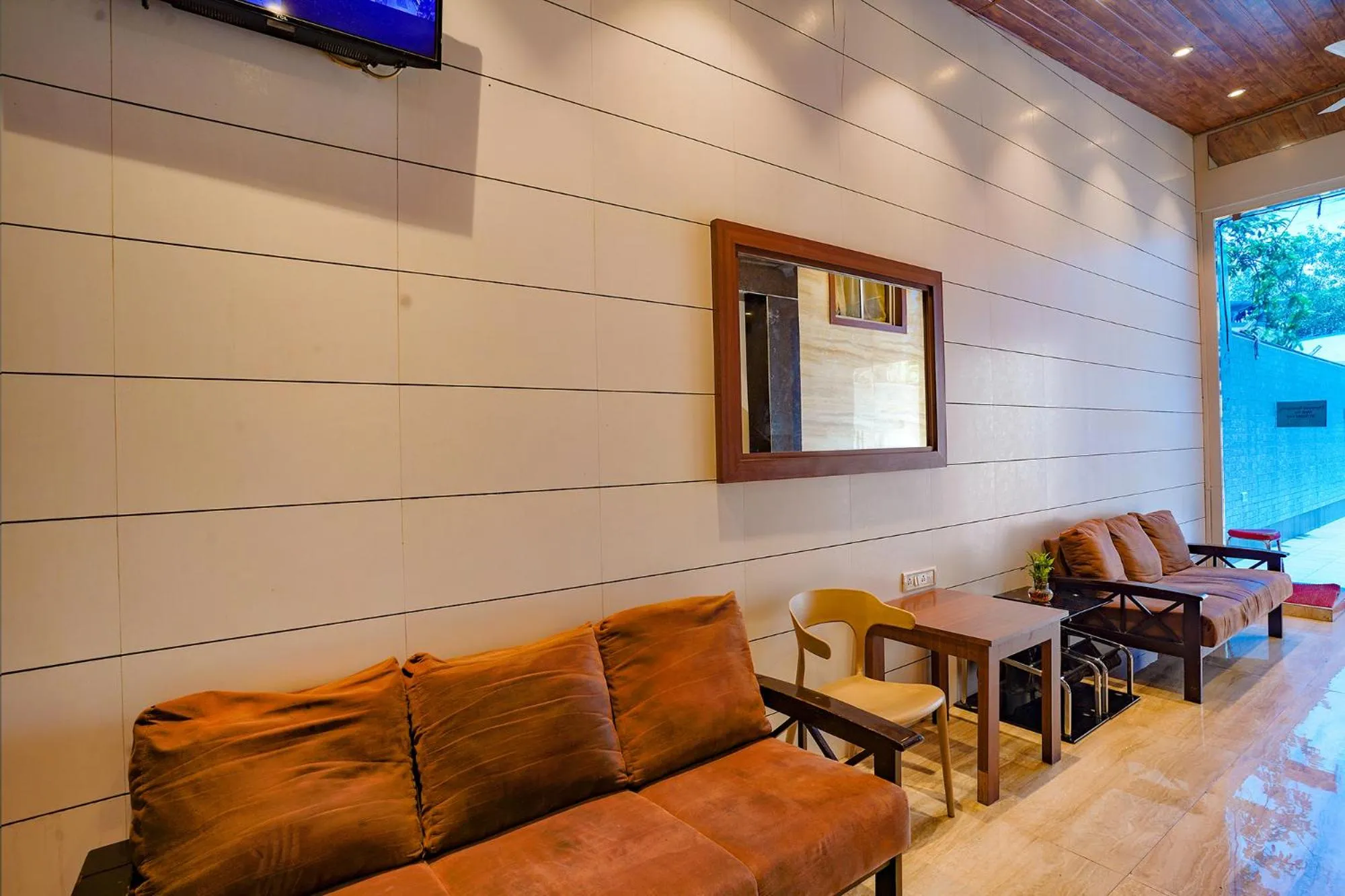Seating area in FabHotel Starwood Residency - 100M From Dr DY Patil Stadium